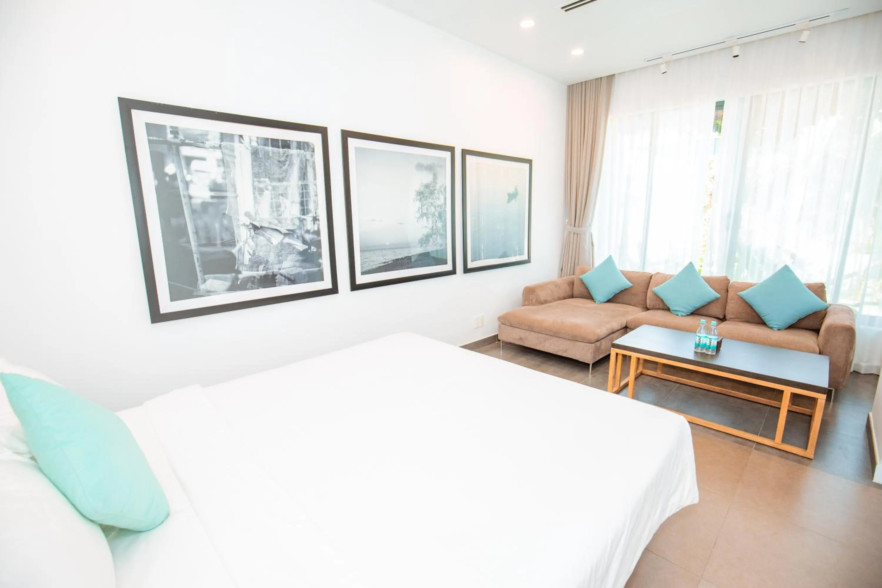 Bed in Beachfront 4 Bedrooms private pool villa Sanctuary Ho Tram resort