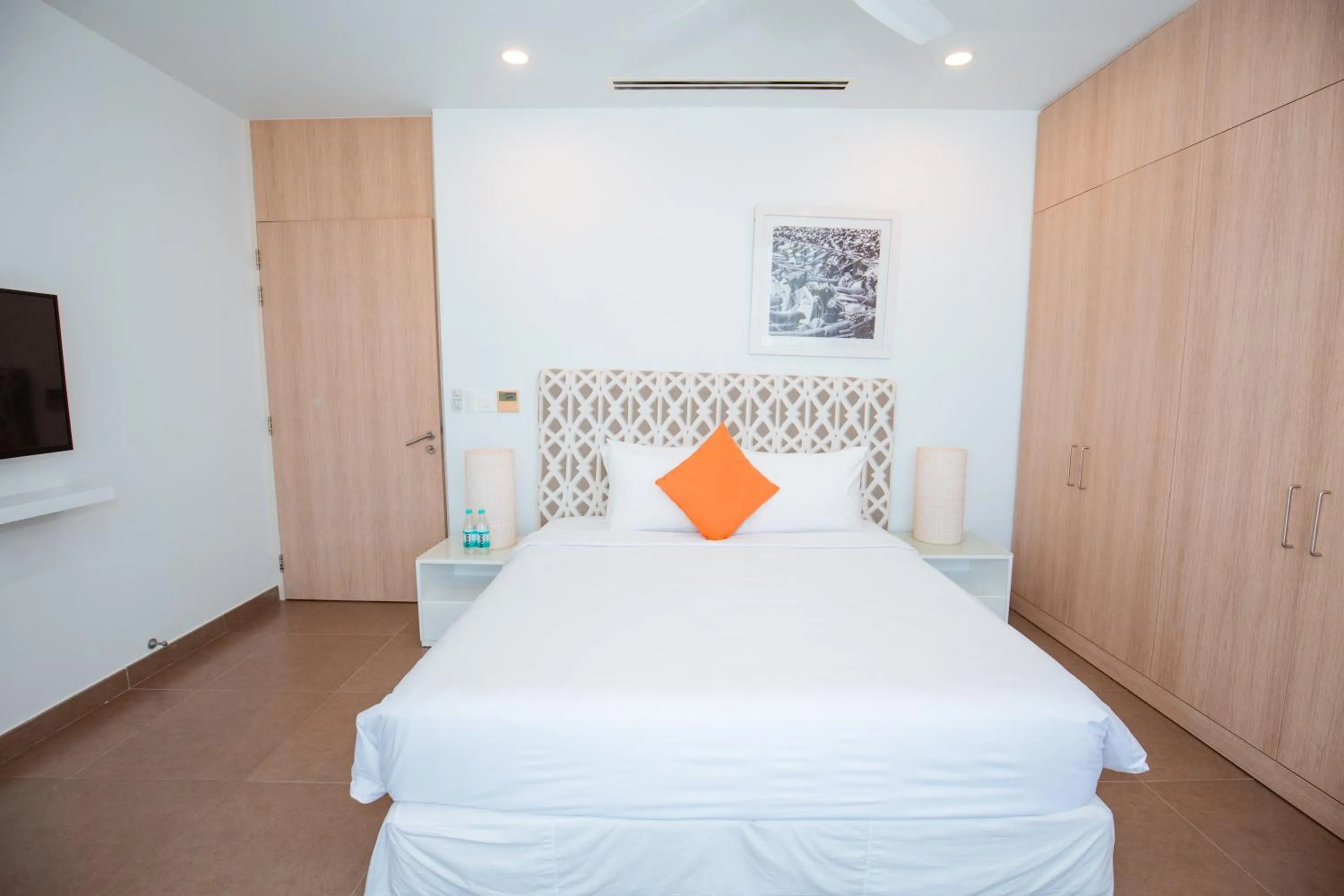 Bed in Beachfront 4 Bedrooms private pool villa Sanctuary Ho Tram resort