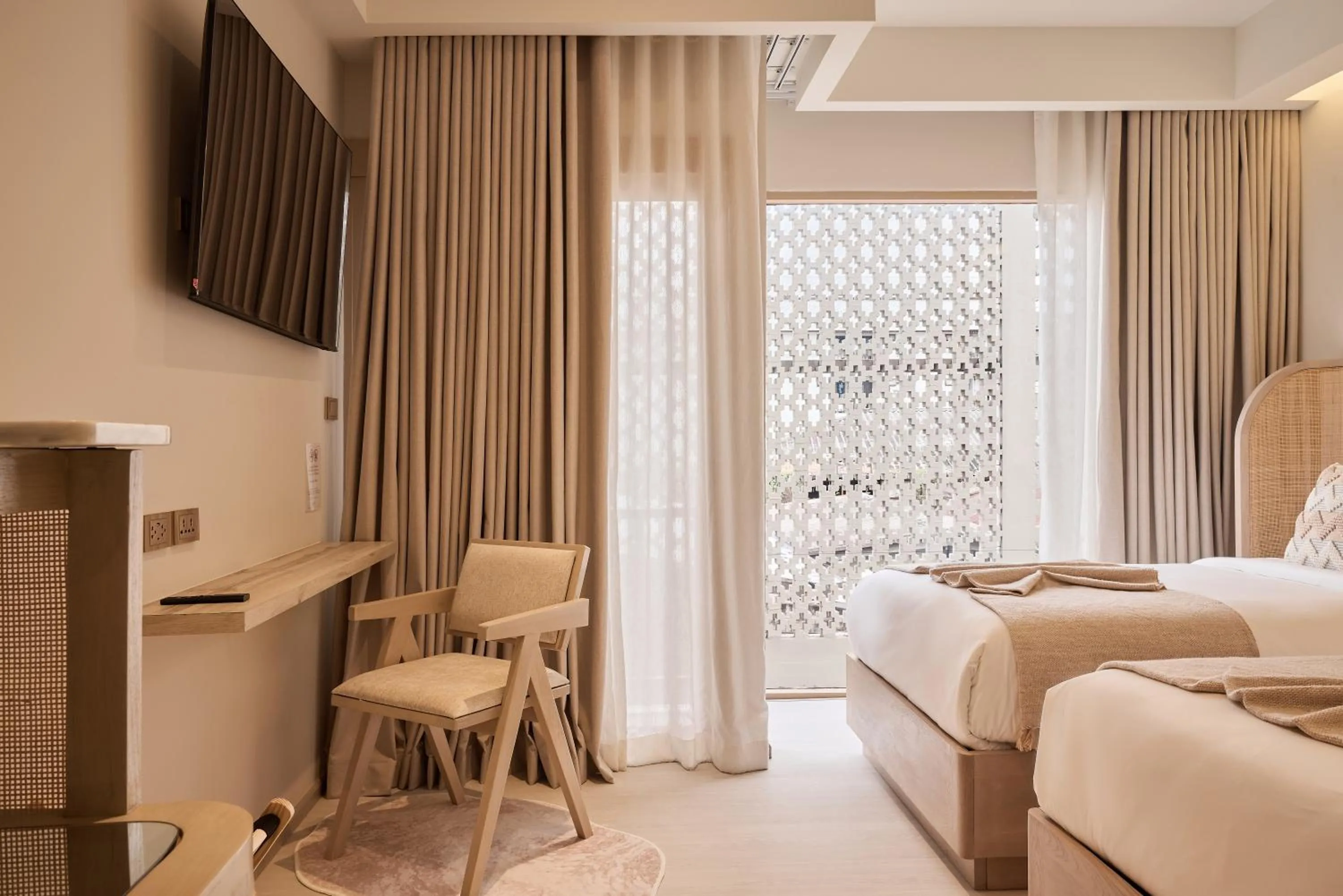 Bed in PE-LA Thapae Boutique Hotel