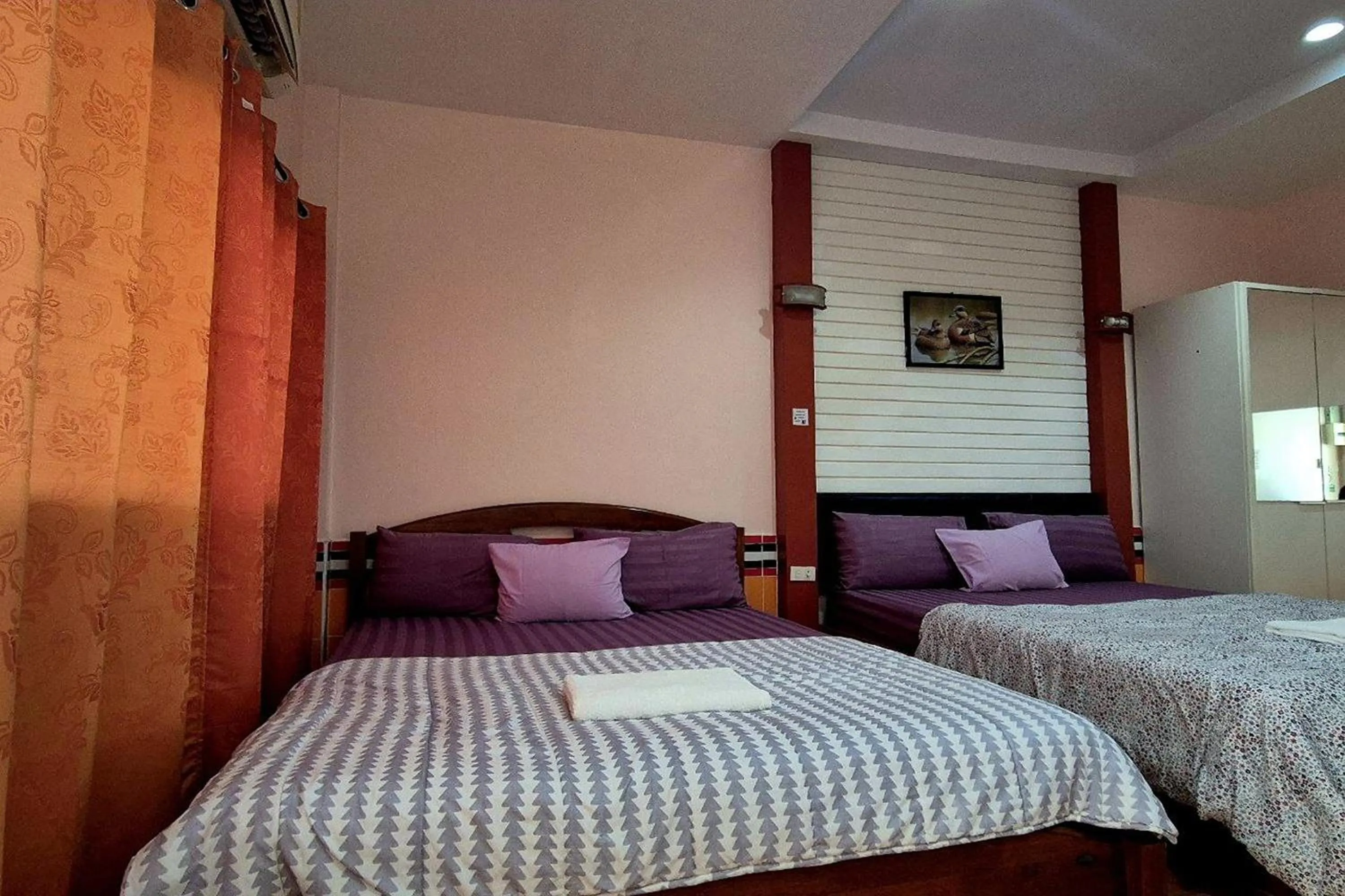 Bed in KhiangLe Resort 1