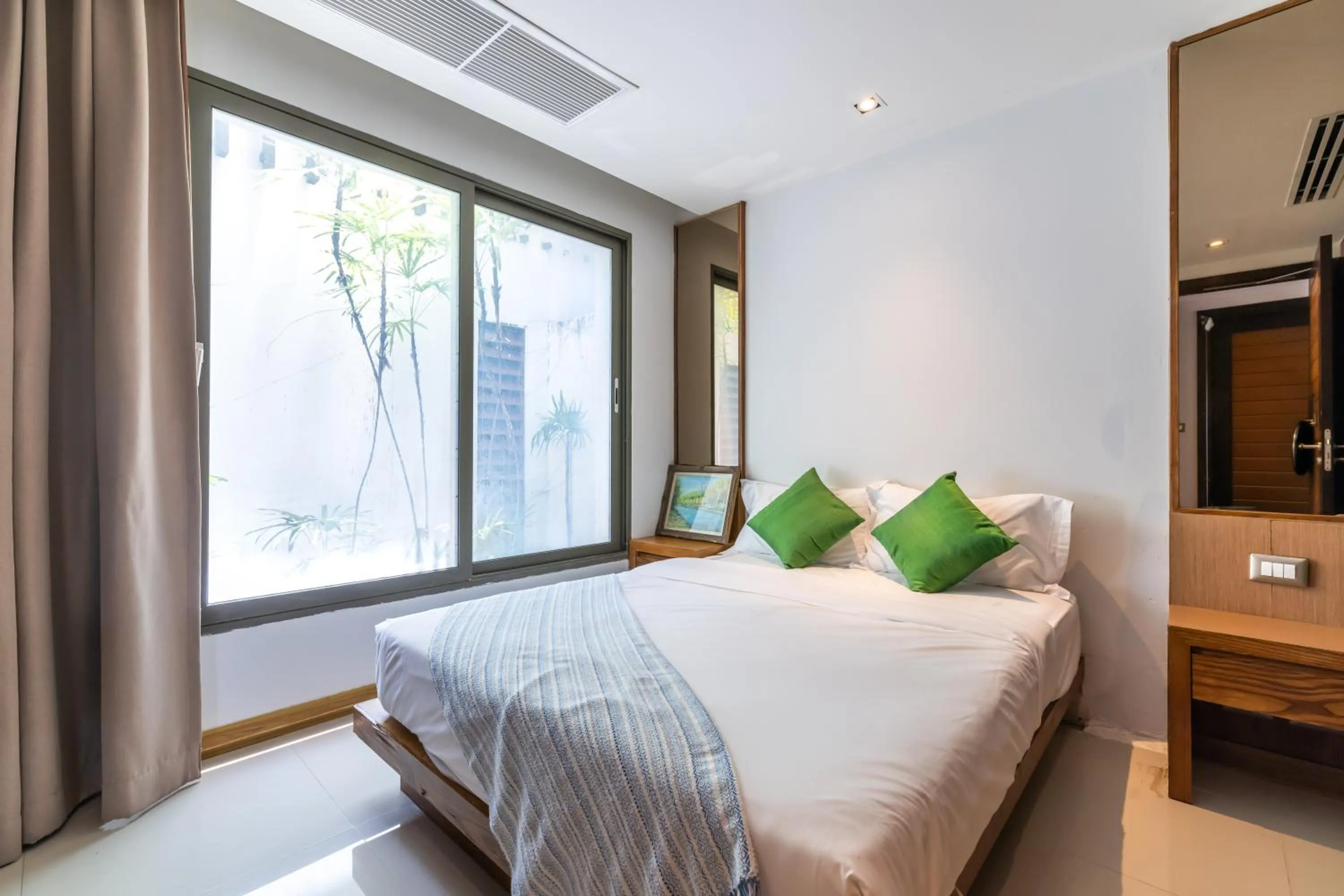 Bed in Phuket Moonlit Bay Seaview Resort & Spa