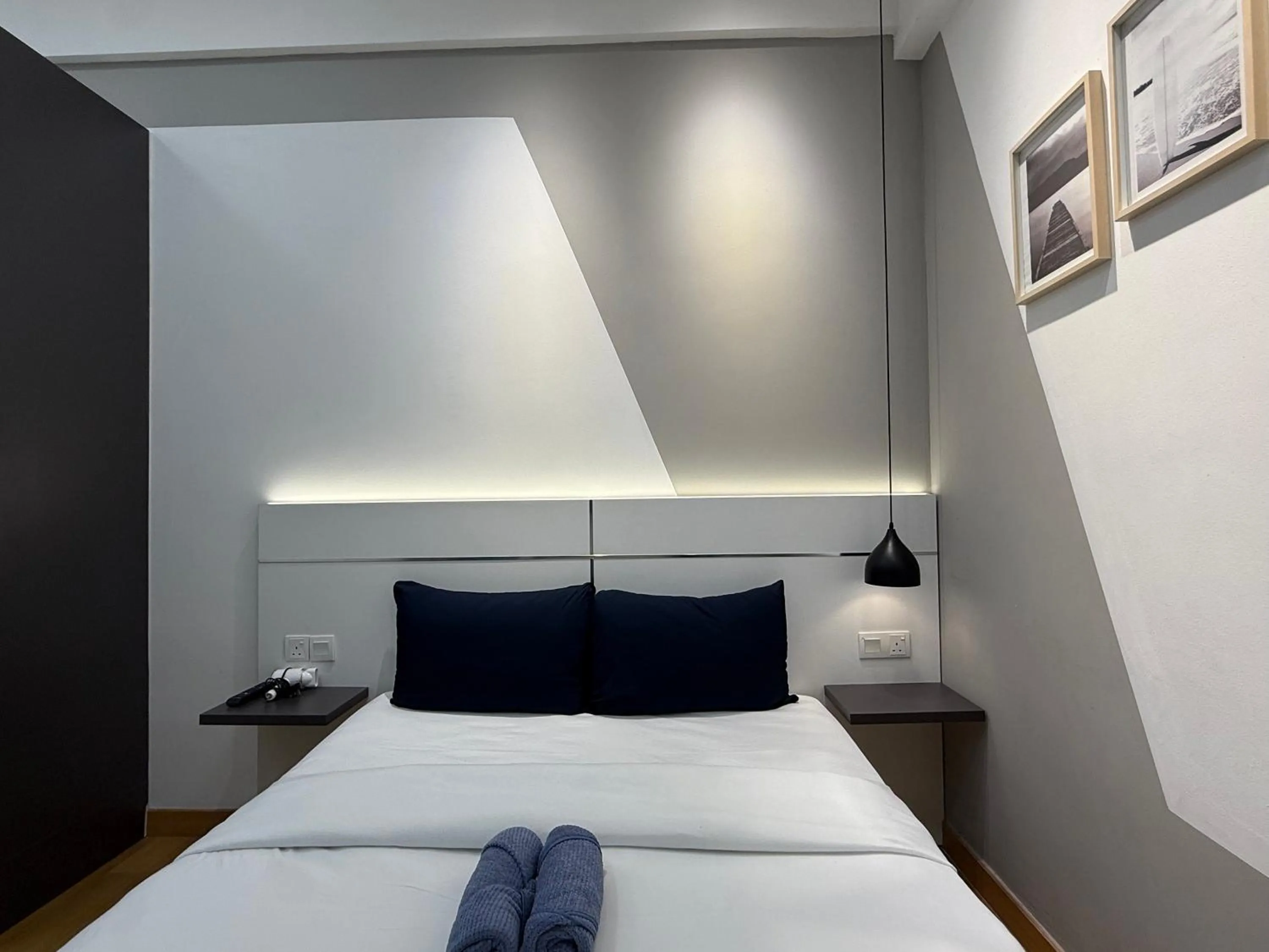 Bed in The Luxe by Infinitum Suites