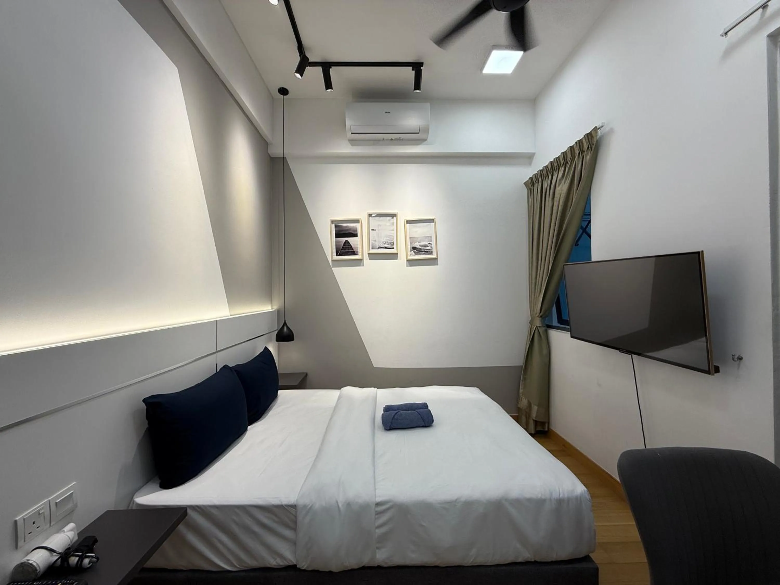 Bed in The Luxe by Infinitum Suites