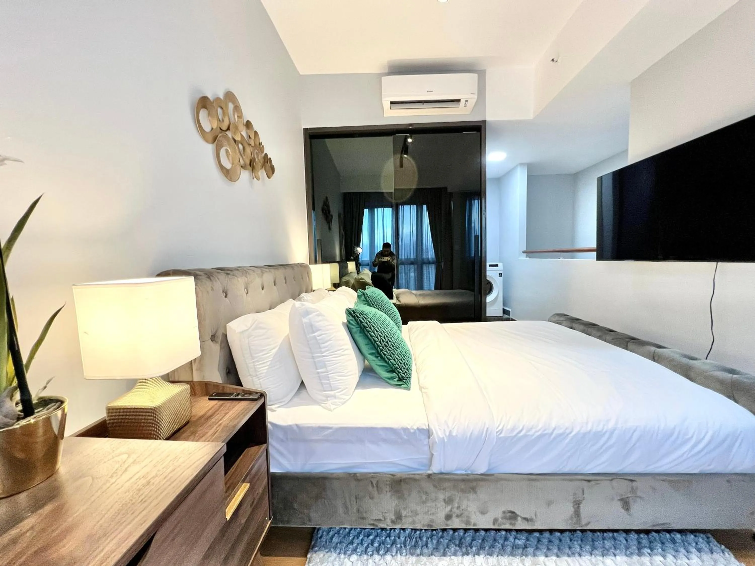 Bed in The Luxe by Infinitum Suites
