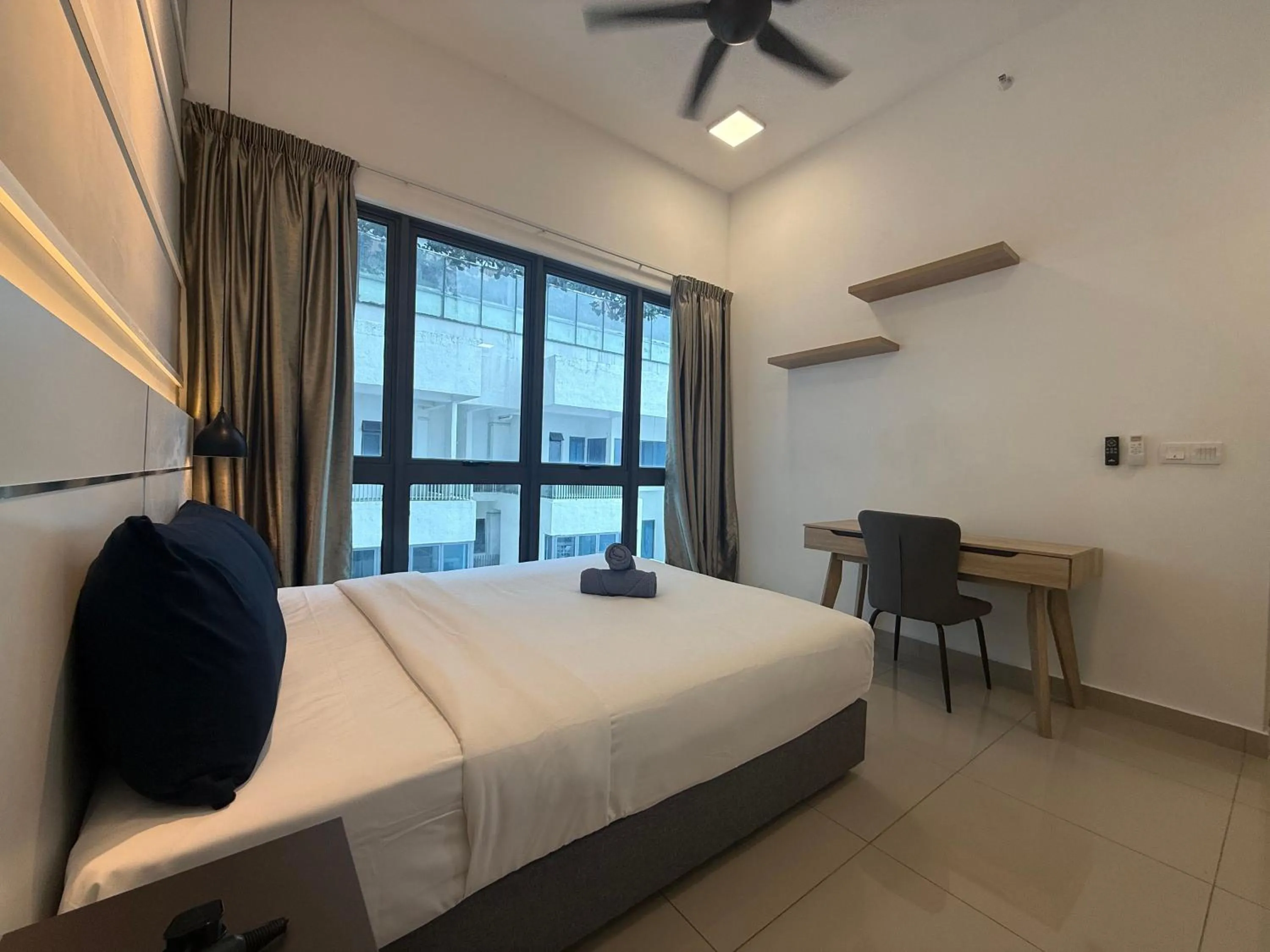 Bed in The Luxe by Infinitum Suites