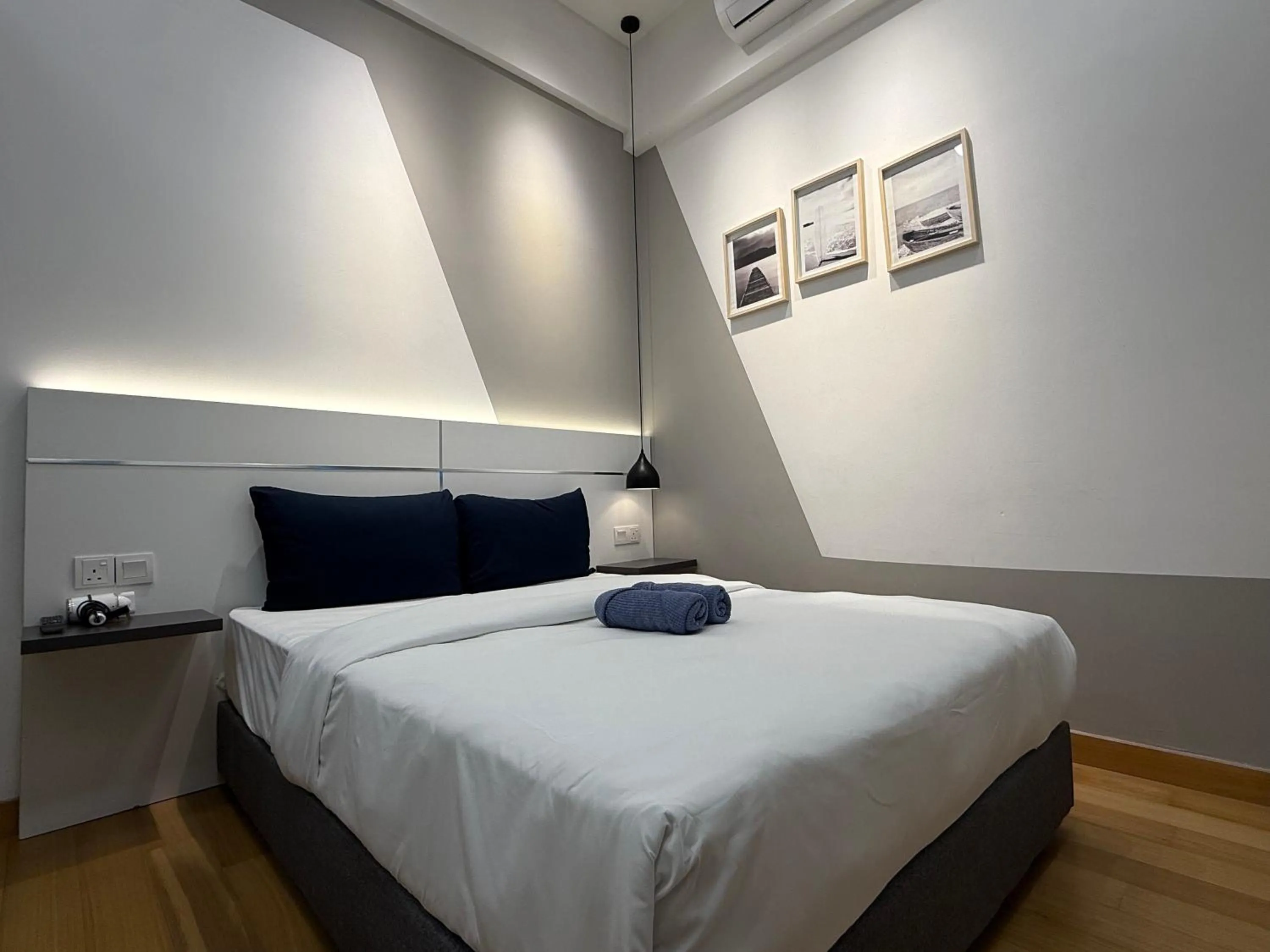 Bed in The Luxe by Infinitum Suites