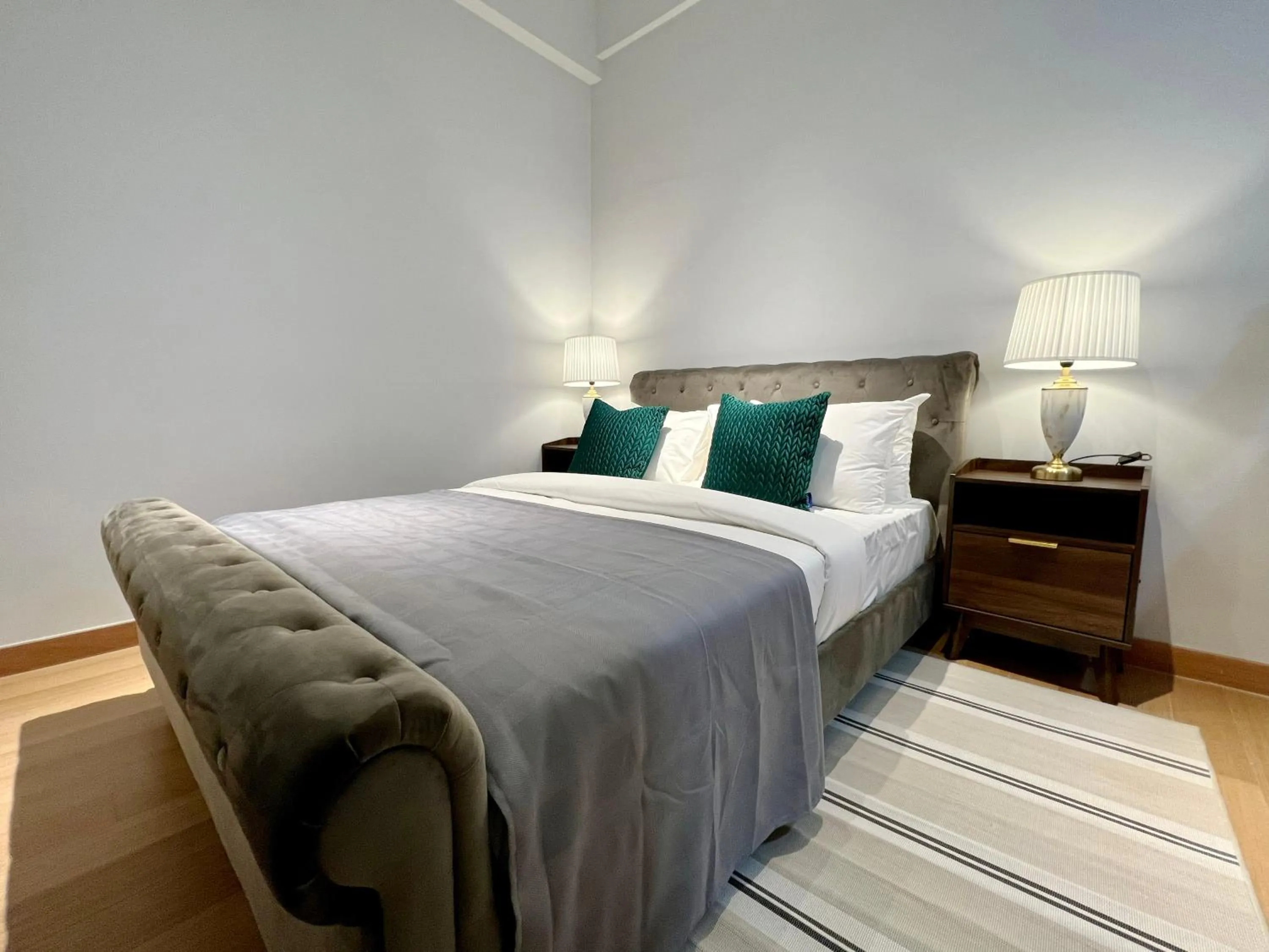 Bed in The Luxe by Infinitum Suites