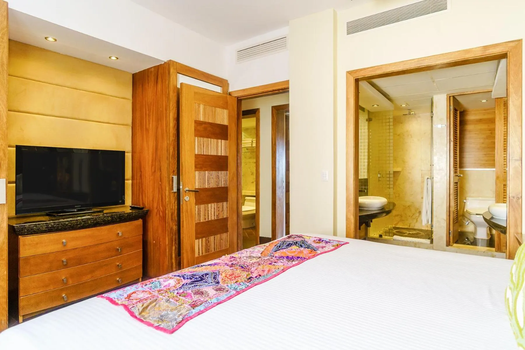 Bed in Aldea Thai by Stella Rentals