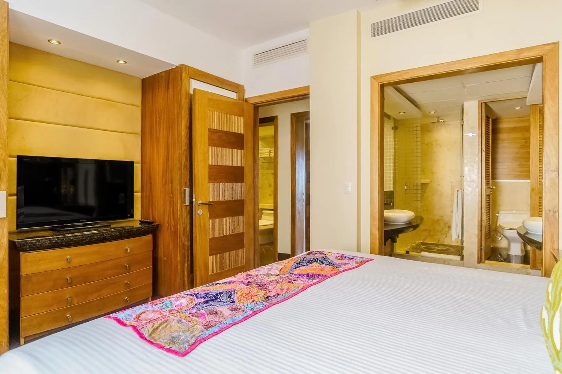 Bed in Aldea Thai by Stella Rentals