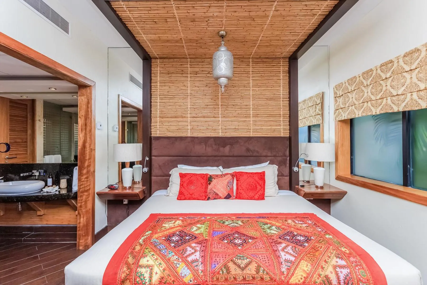 Bed in Aldea Thai by Stella Rentals