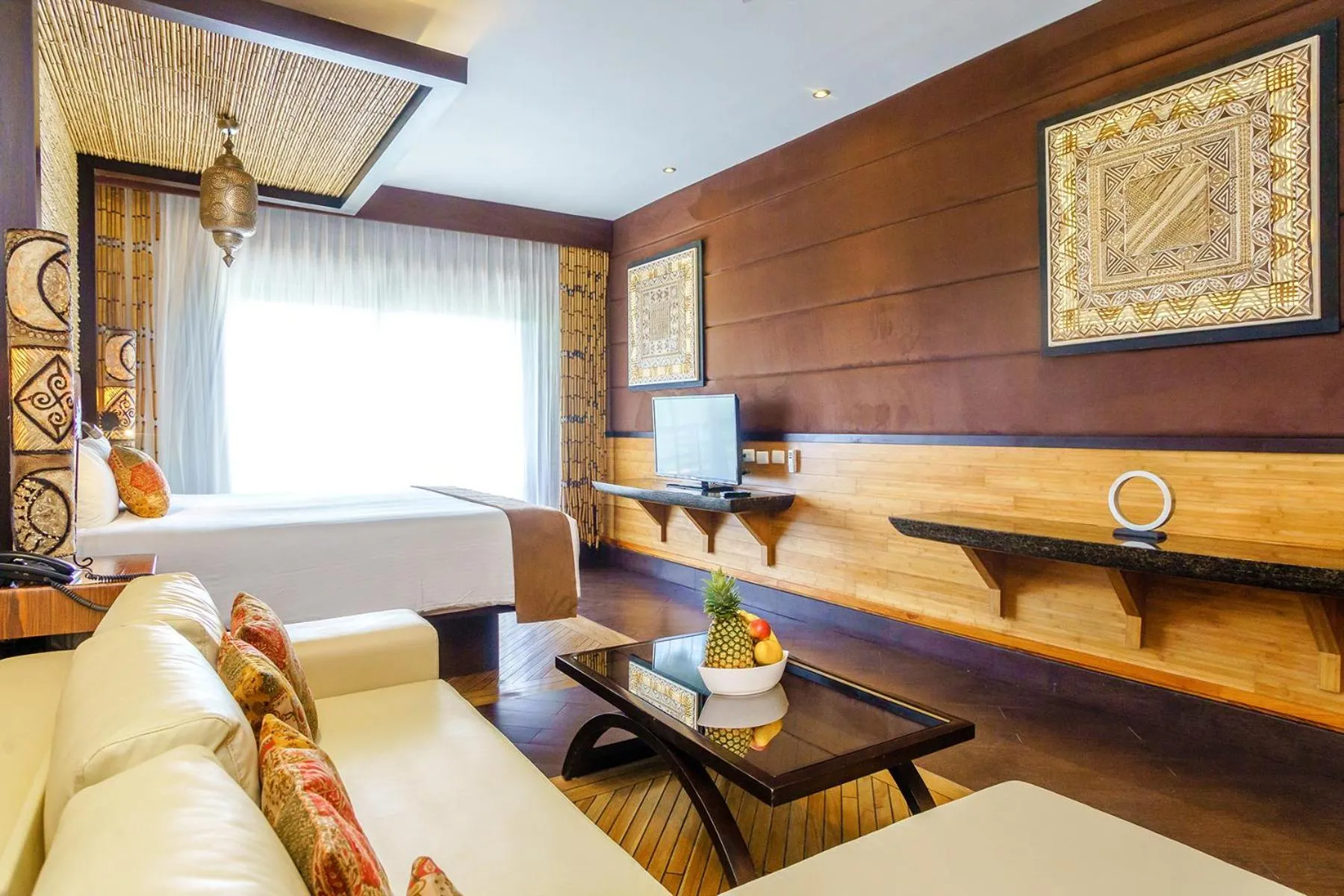 Living room in Aldea Thai by Stella Rentals