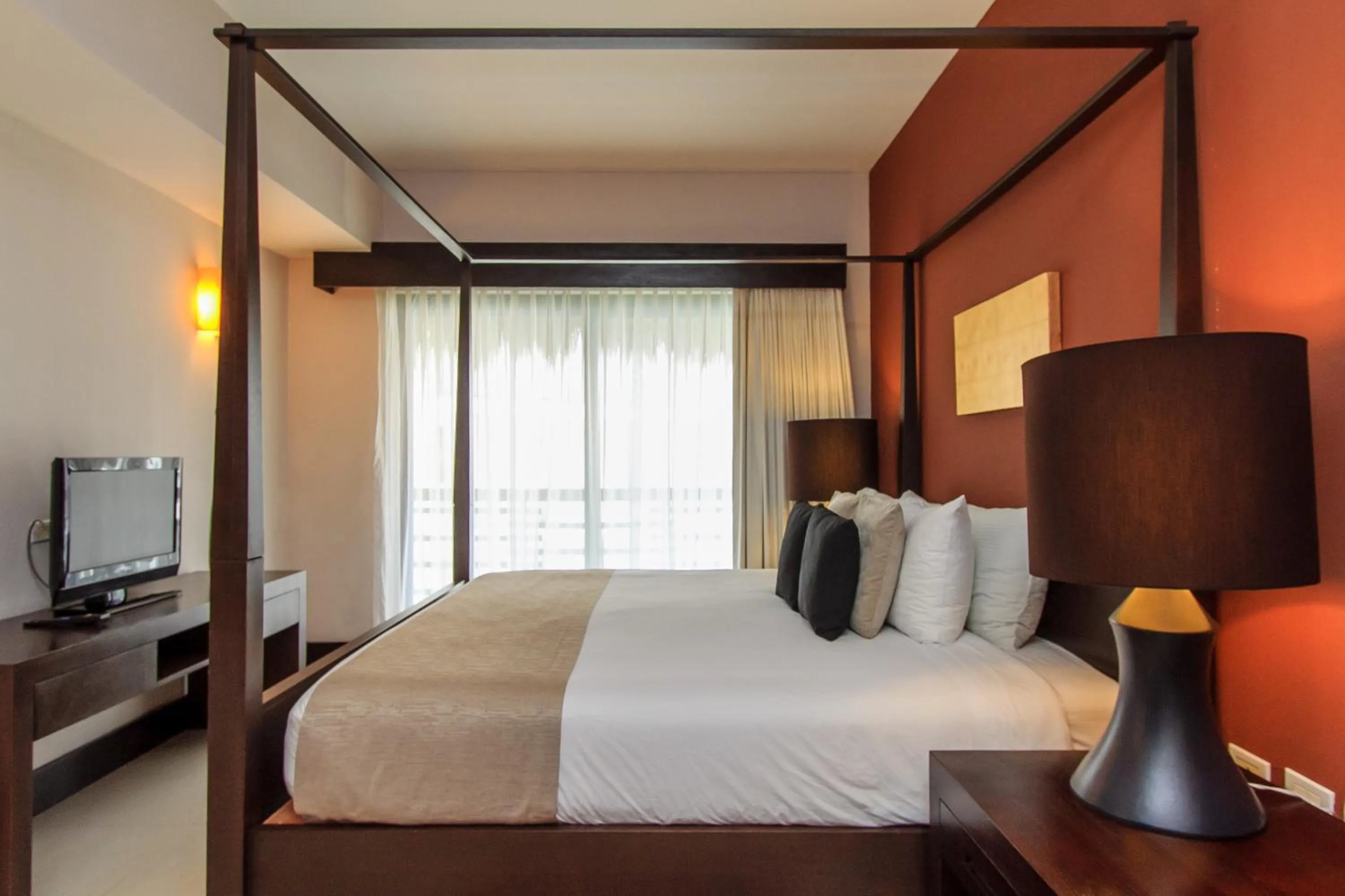 Bed in Aldea Thai by Stella Rentals