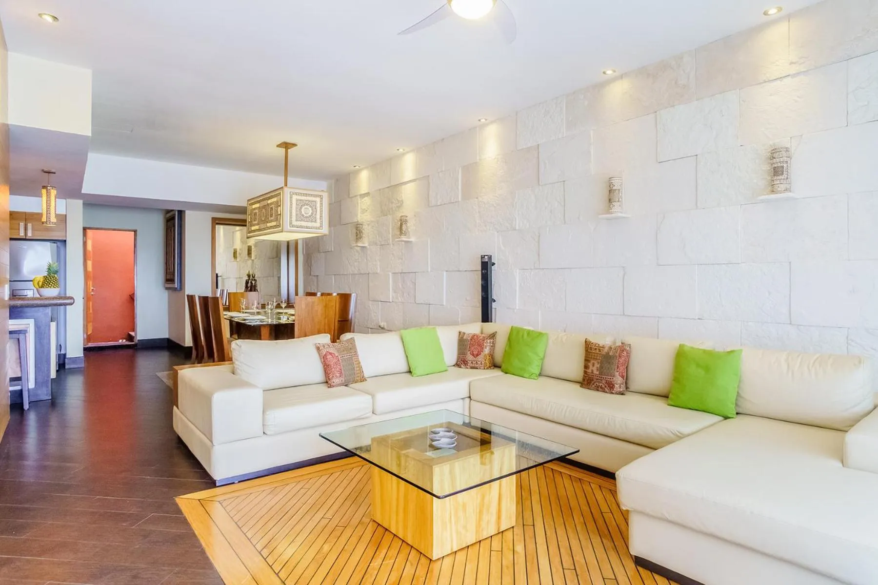 Living room in Aldea Thai by Stella Rentals