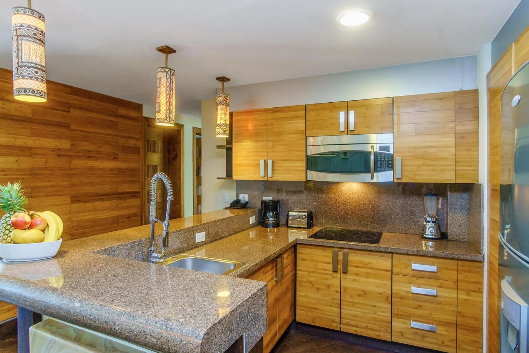 Kitchen or kitchenette in Aldea Thai by Stella Rentals