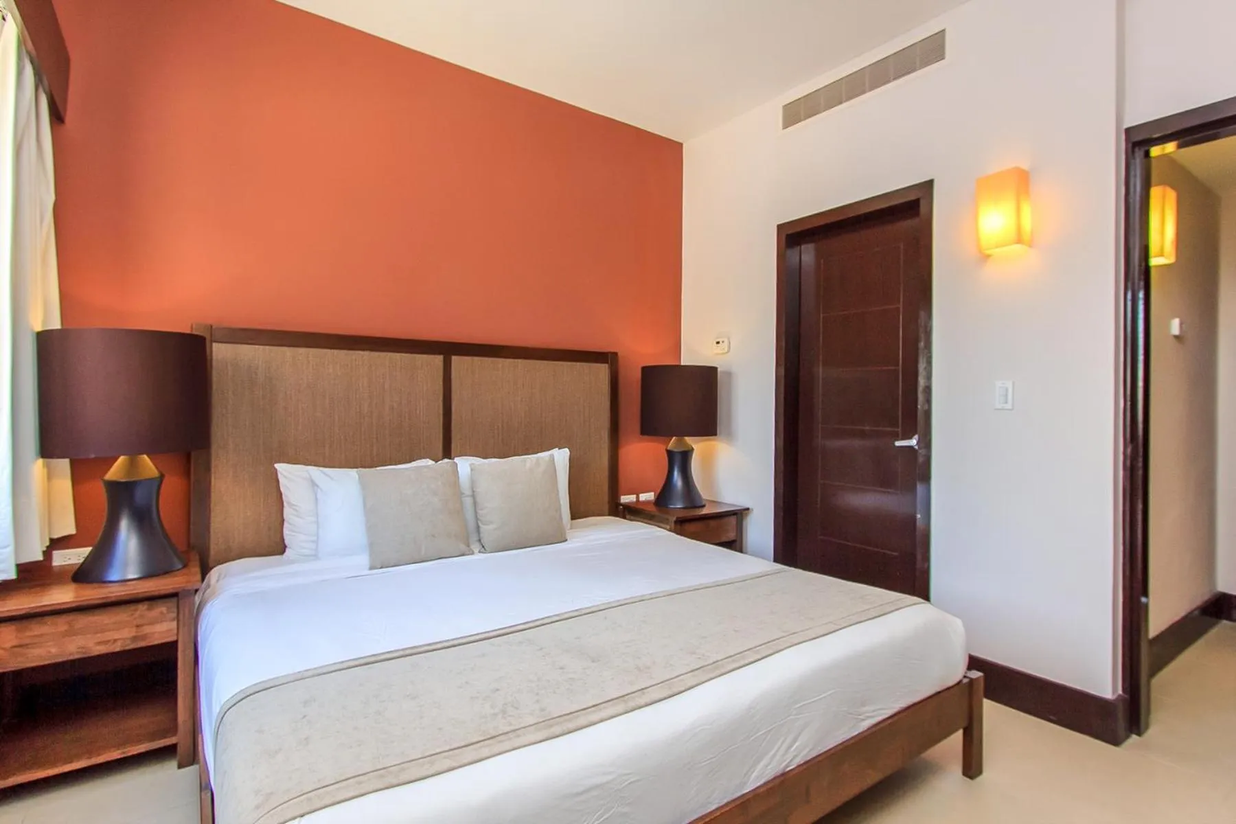 Bed in Aldea Thai by Stella Rentals