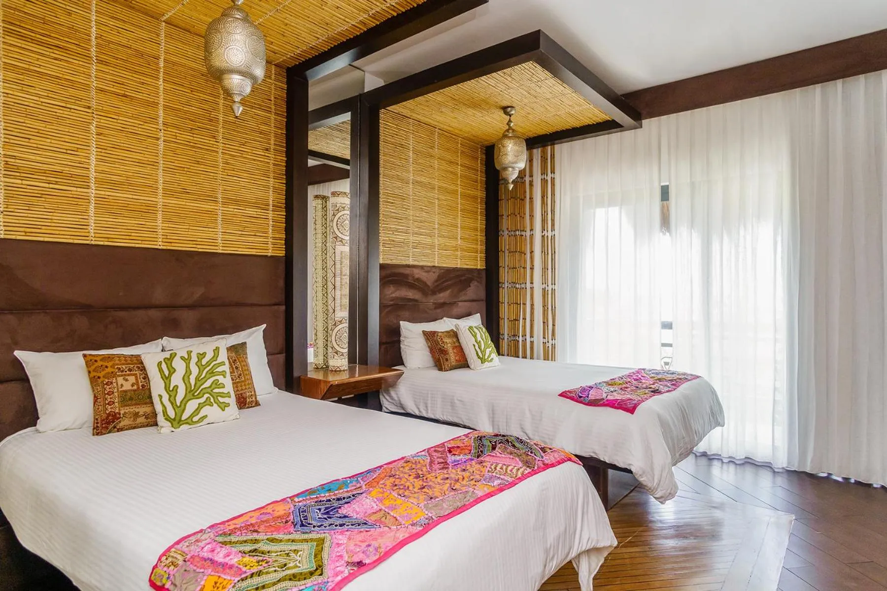 Bed in Aldea Thai by Stella Rentals