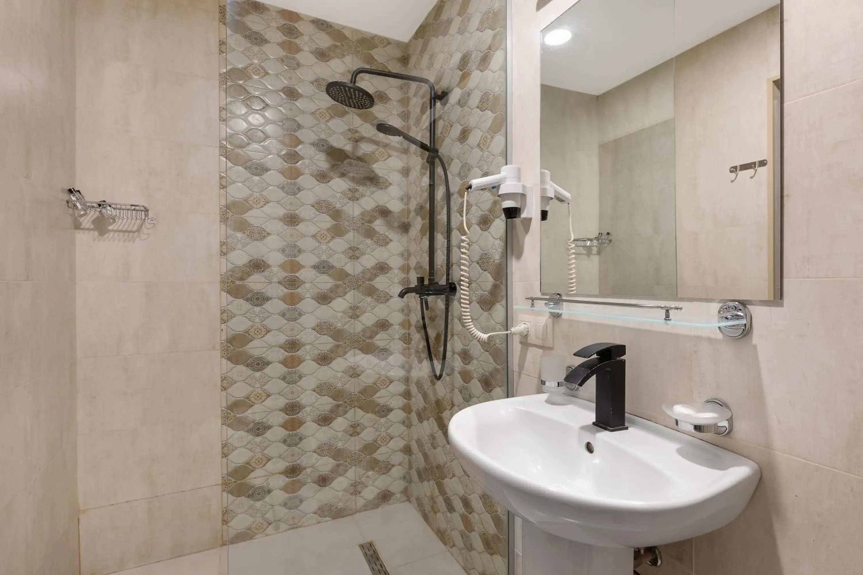 Bathroom in Iveria Inn Hotel Bathroom in Iveria Inn Hotel