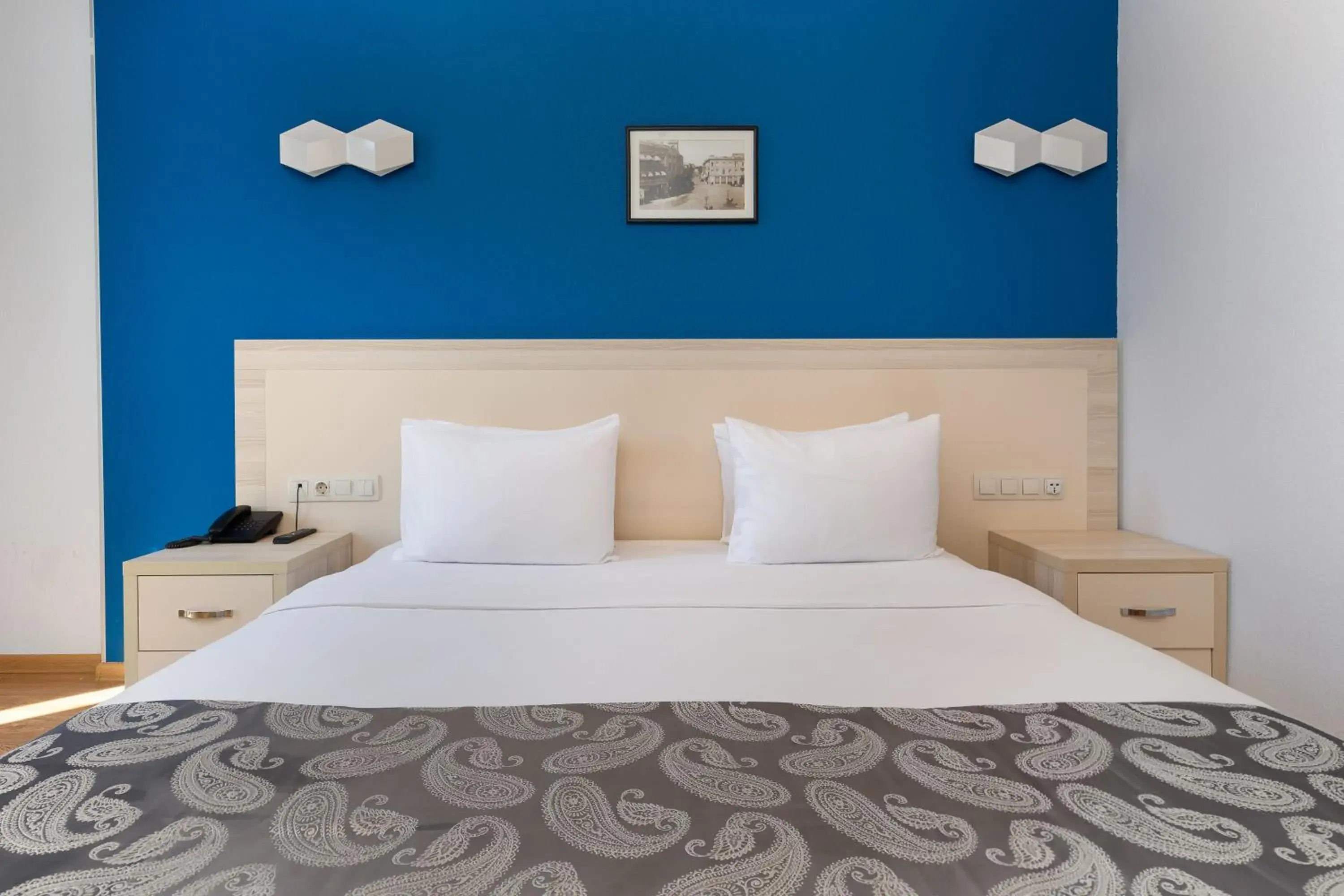 Bed in Iveria Inn Hotel Bed in Iveria Inn Hotel