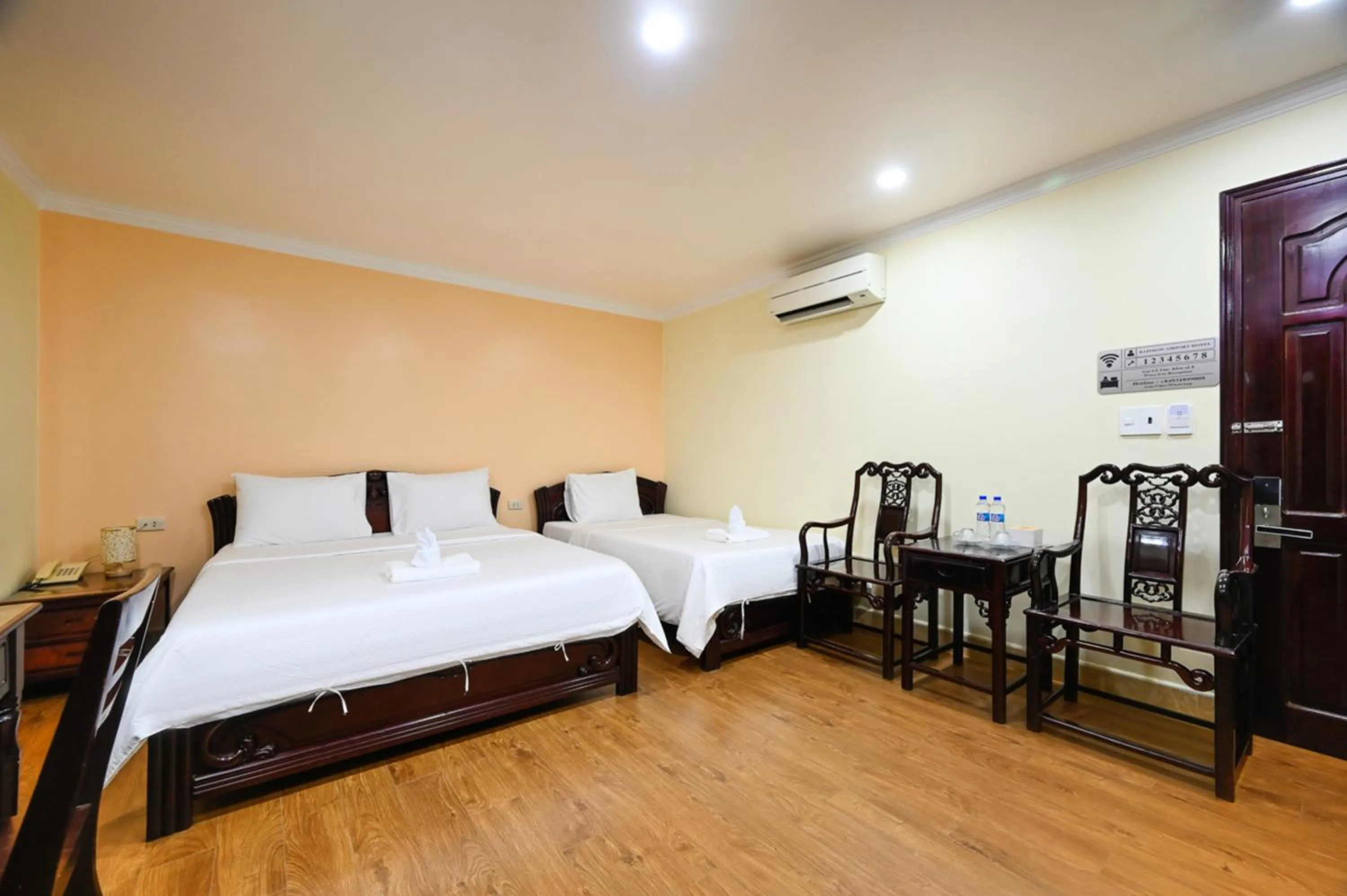 Bed in Rainbow Airport Hotel