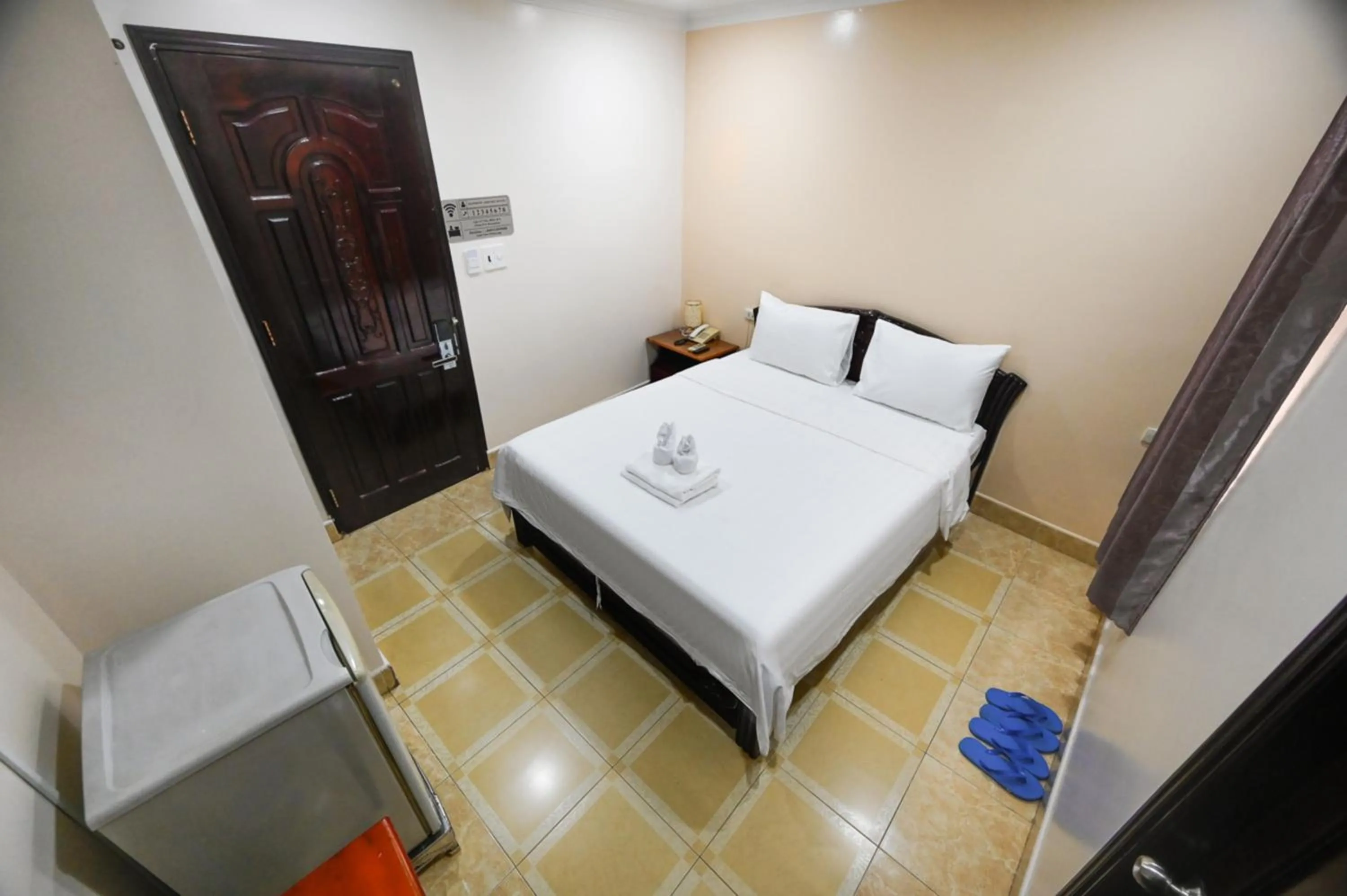 Bed in Rainbow Airport Hotel