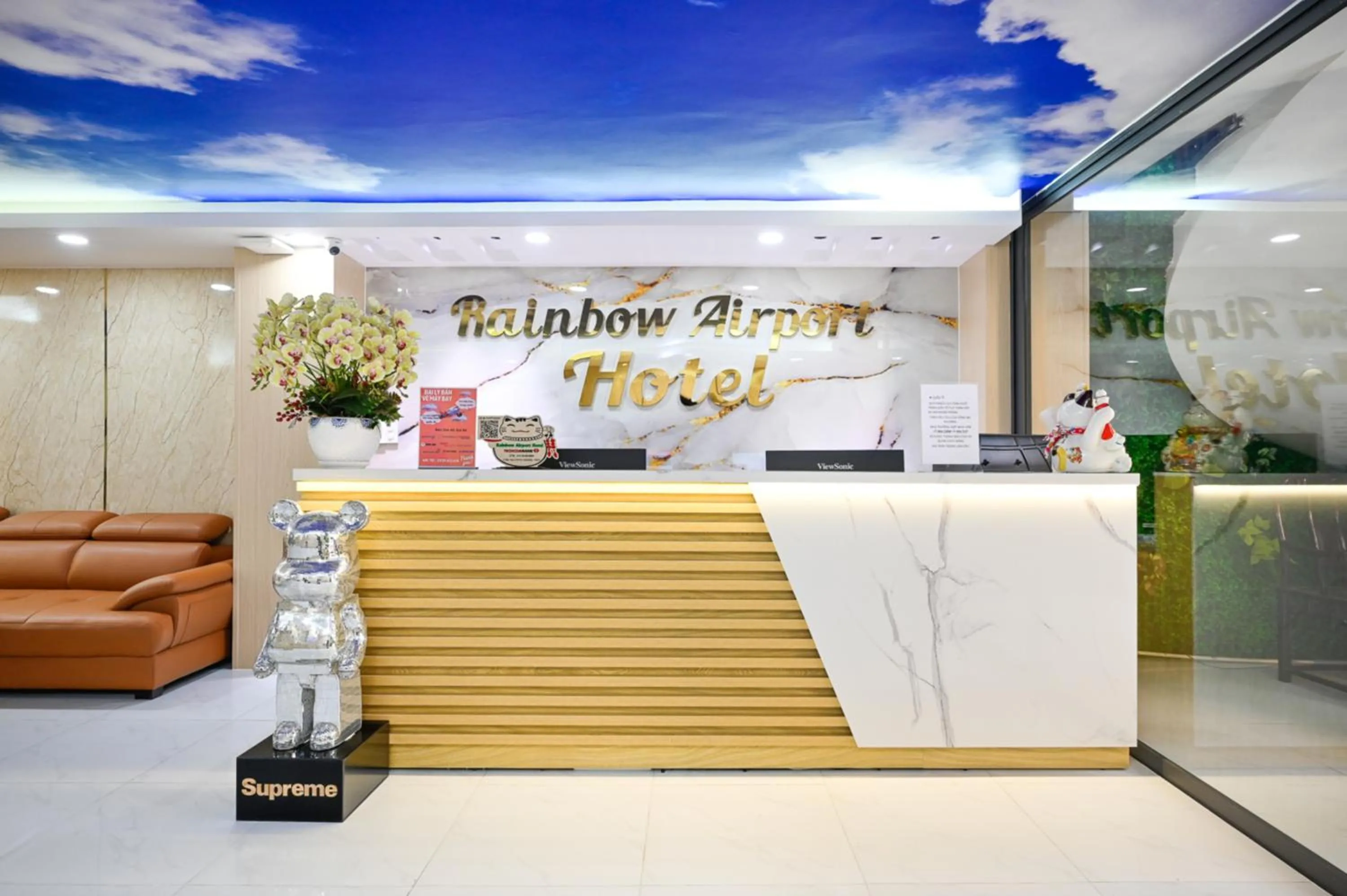 Property logo or sign in Rainbow Airport Hotel