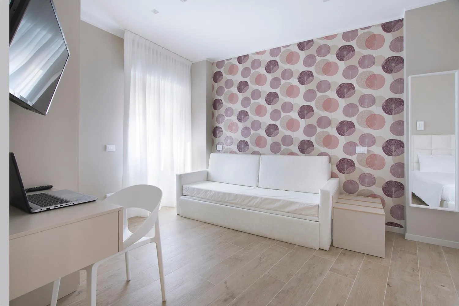 Seating area, Bed in Residence Dolcemare