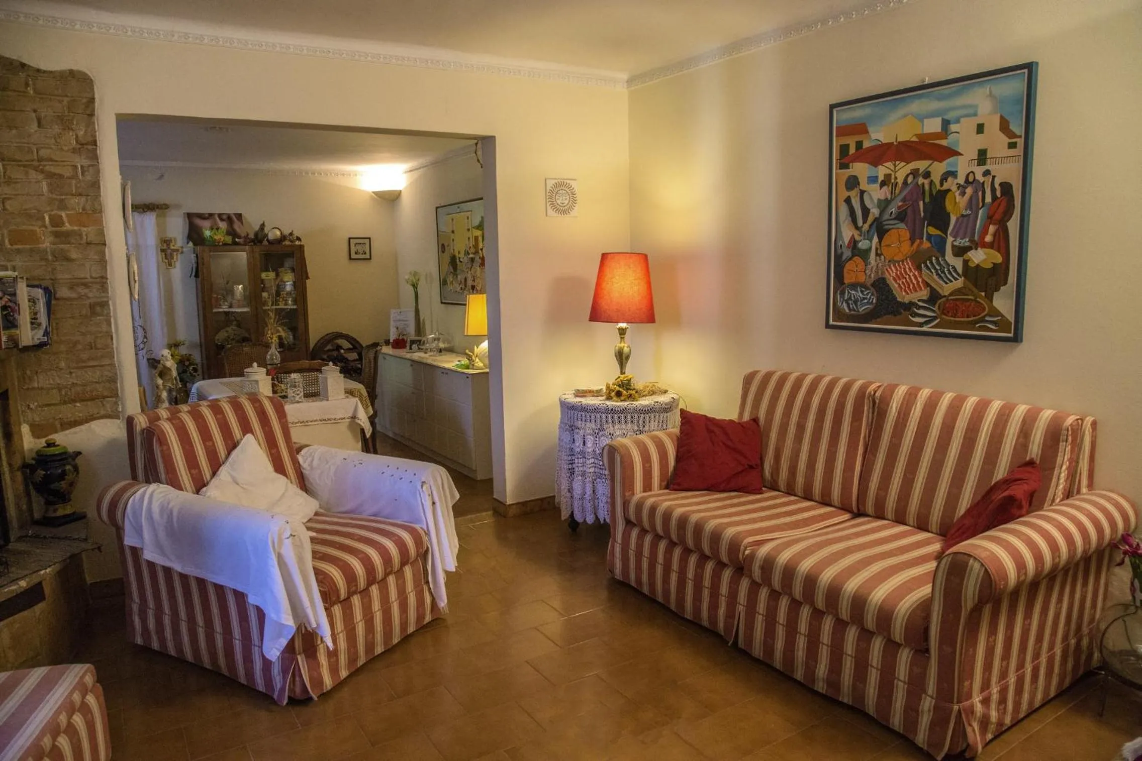 Communal lounge/ TV room in B&B Il Giardino