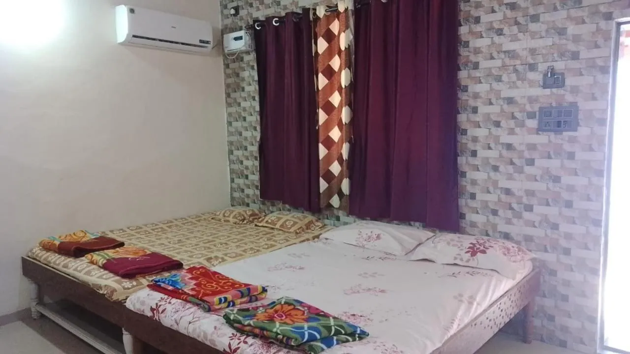 Bed in Tendulkar Beach Resort