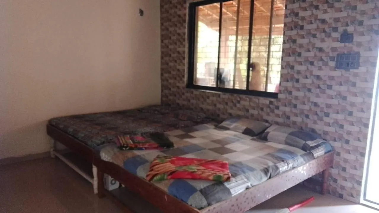 Bed in Tendulkar Beach Resort
