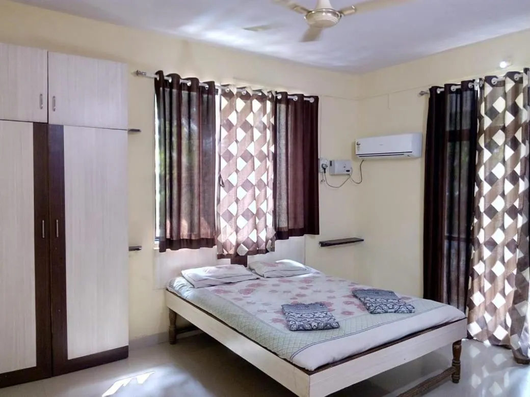 Bed in Tendulkar Beach Resort