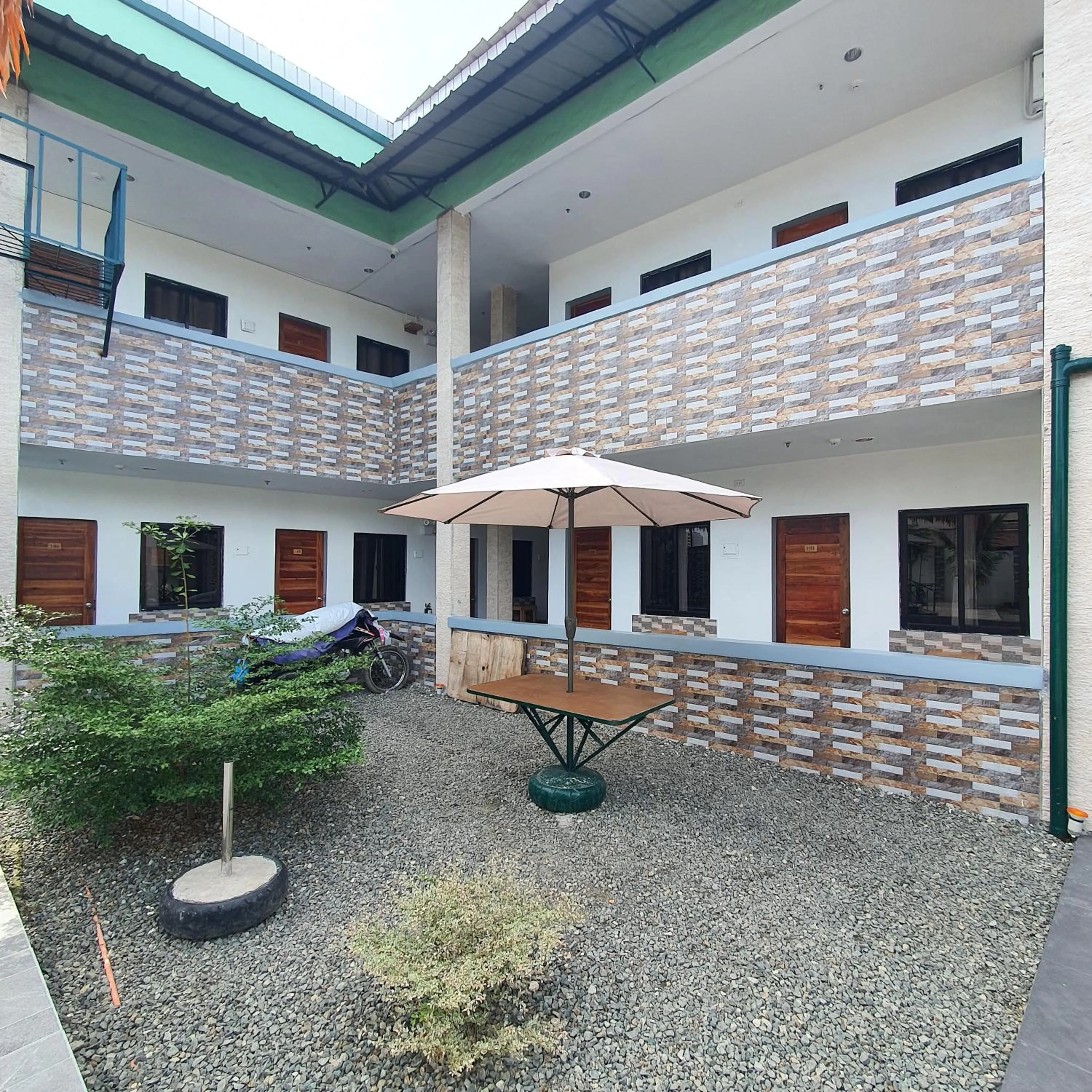 Property building in AOSMECPoolCamp Hotel