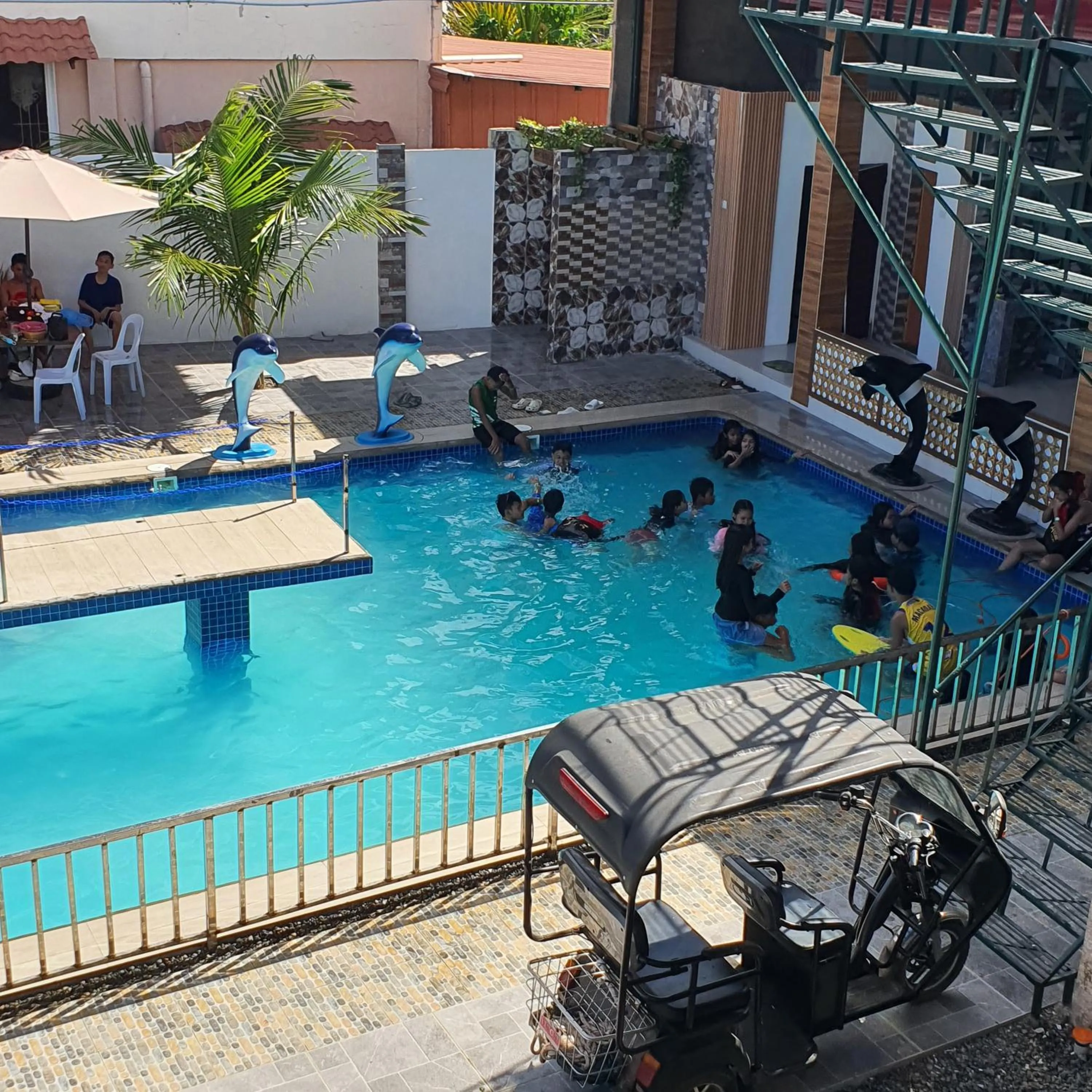 Property building in AOSMECPoolCamp Hotel