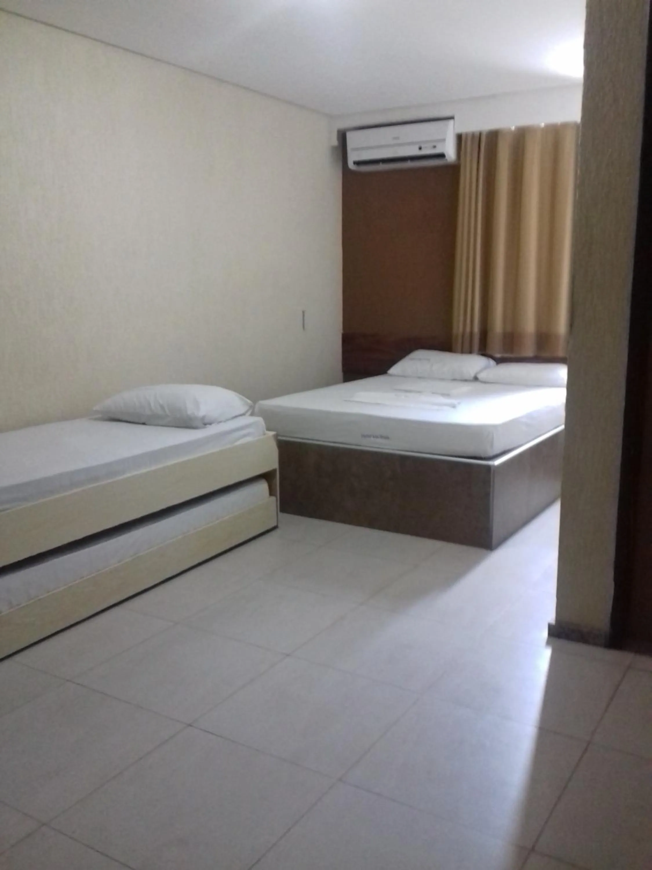 Bed in Hotel Uzi Praia