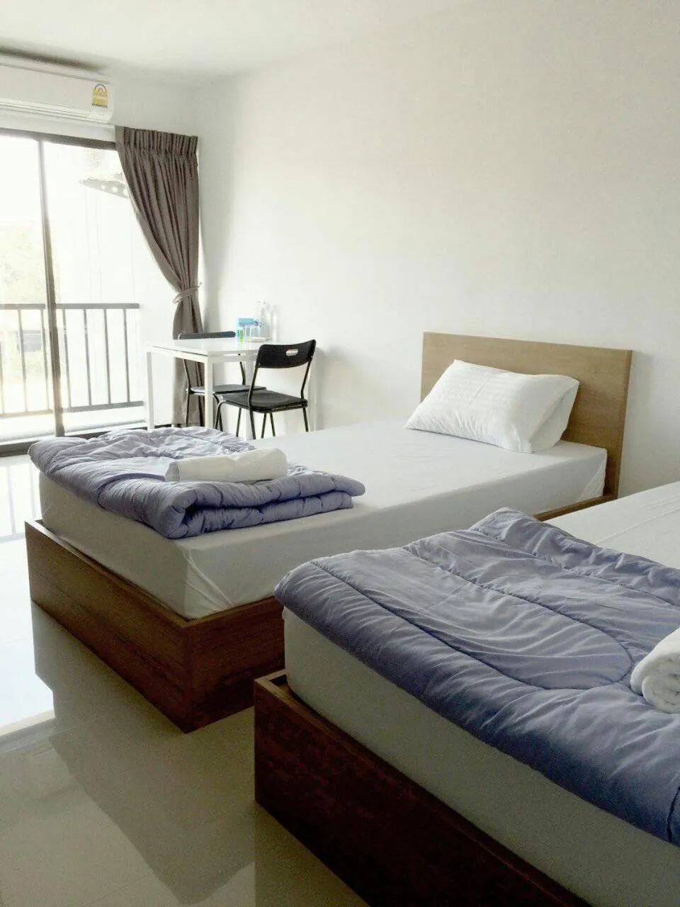 Bed in Promsook Apartment