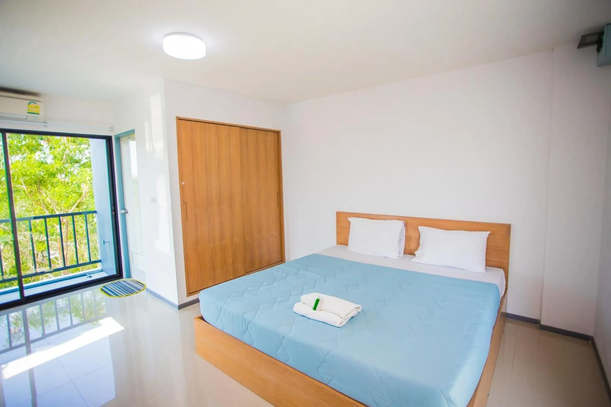 Bed in Promsook Apartment