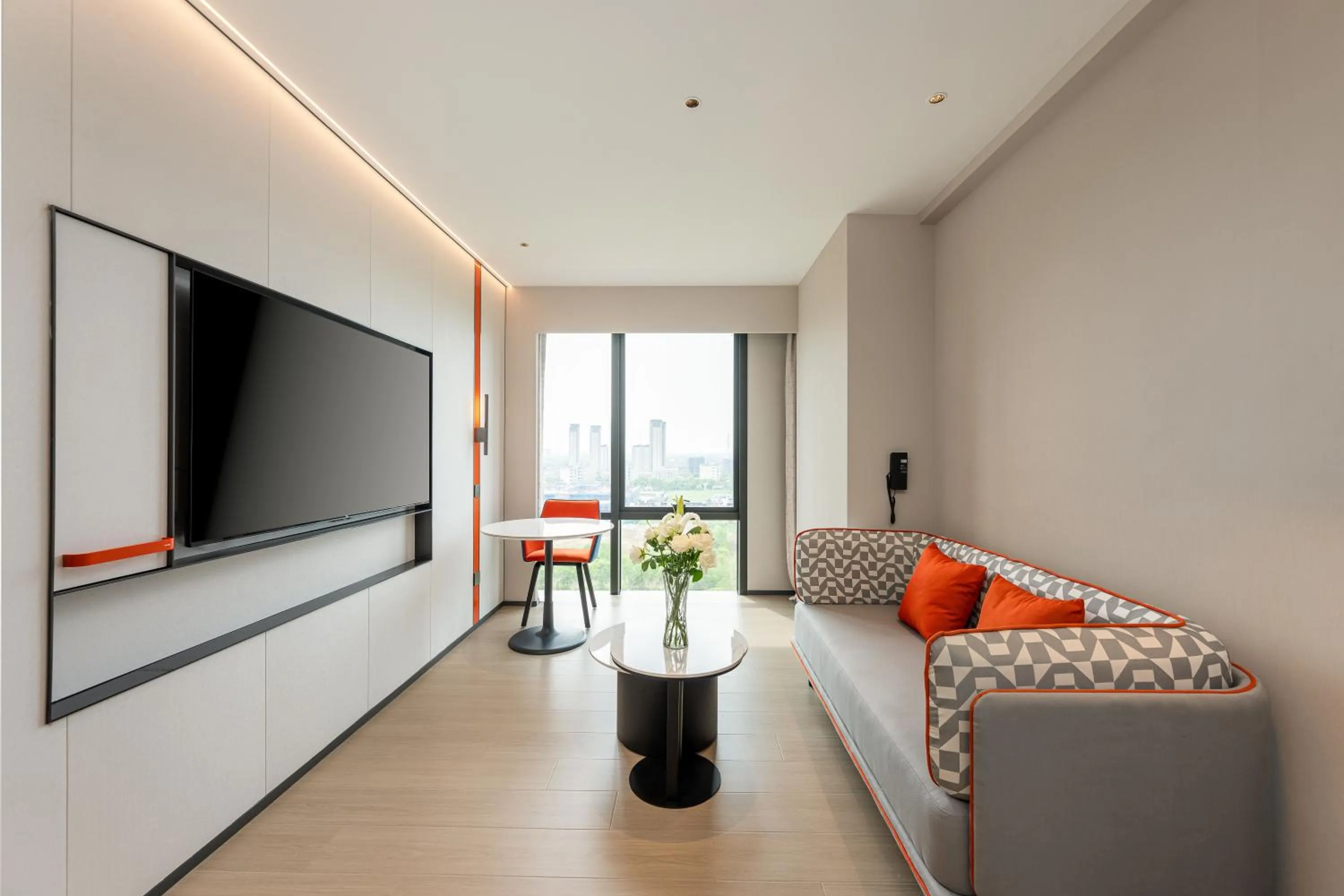 Living room in Holiday Inn Express Kunshan Yushan by IHG