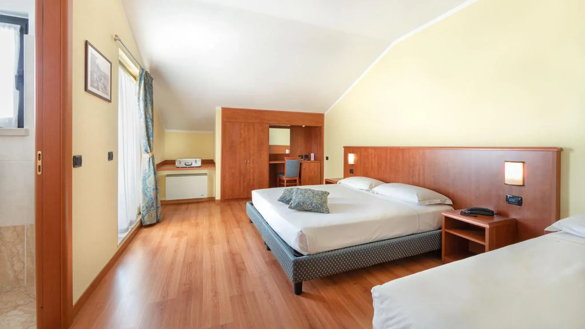 Bed in Hotel Postumia Bed in Hotel Postumia