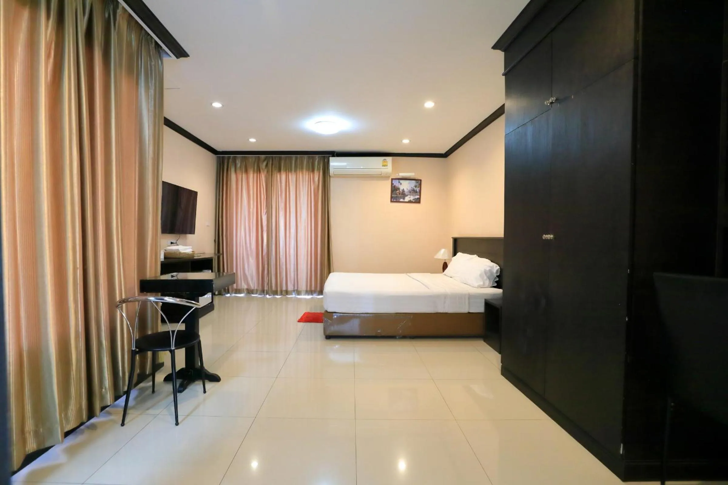 Bed in Triton Hotel Nakhonratchasima โรงแรมไททัน