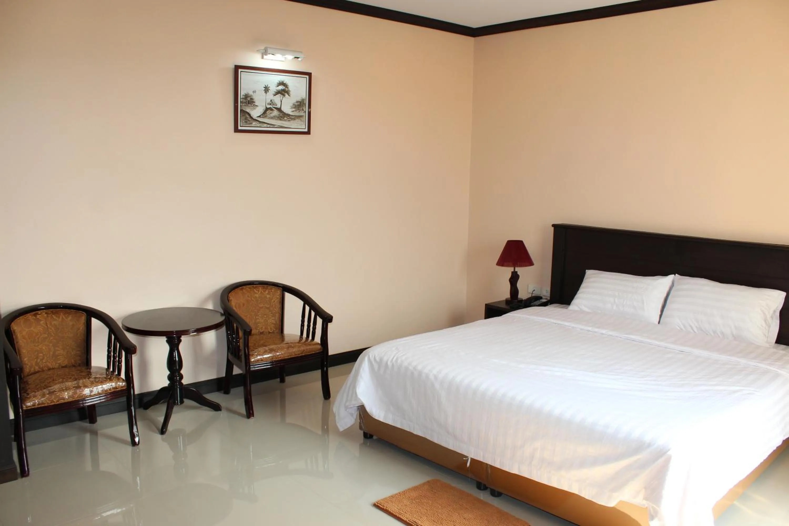 Photo of the whole room, Bed in Triton Place