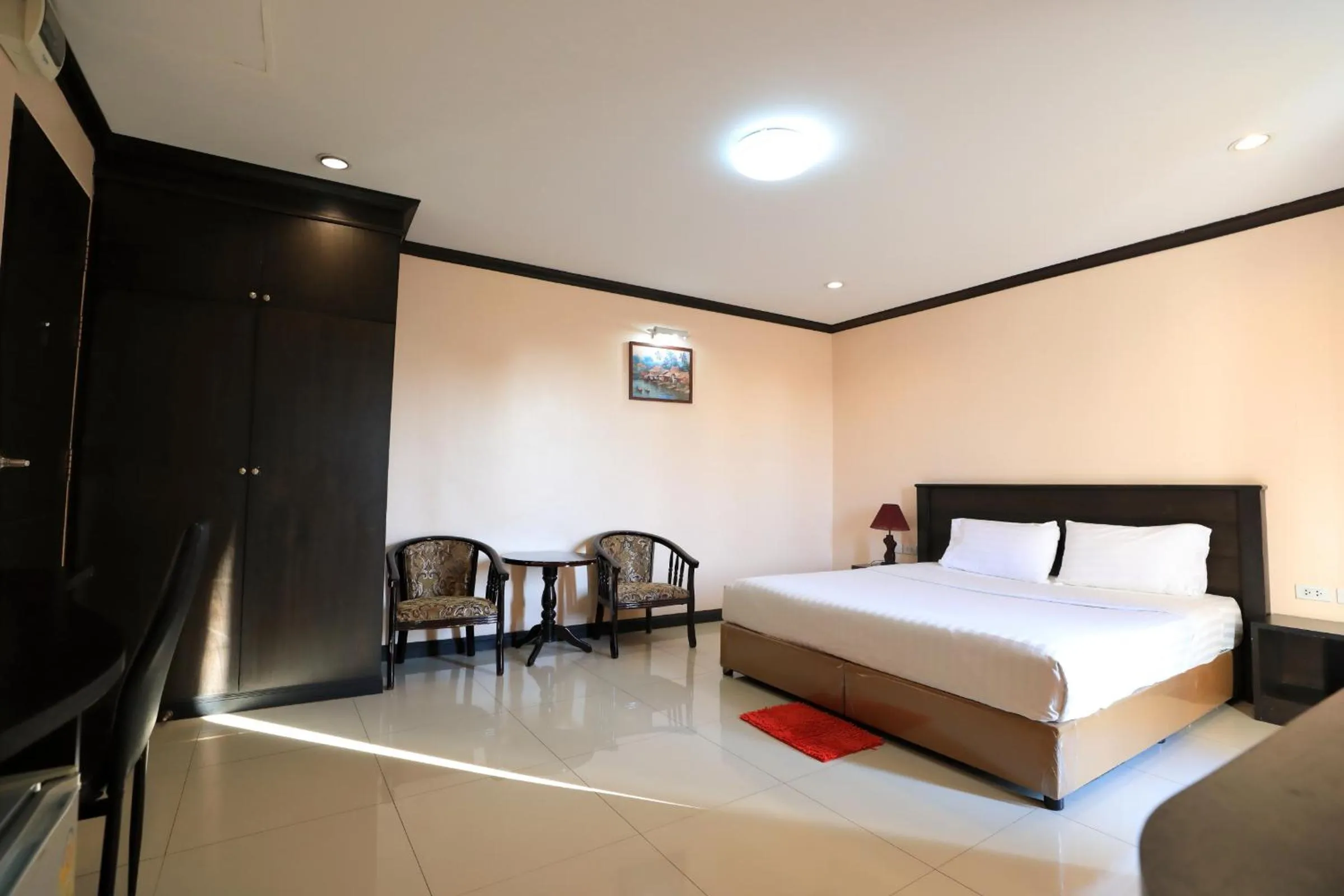 Bed in Triton Hotel Nakhonratchasima โรงแรมไททัน