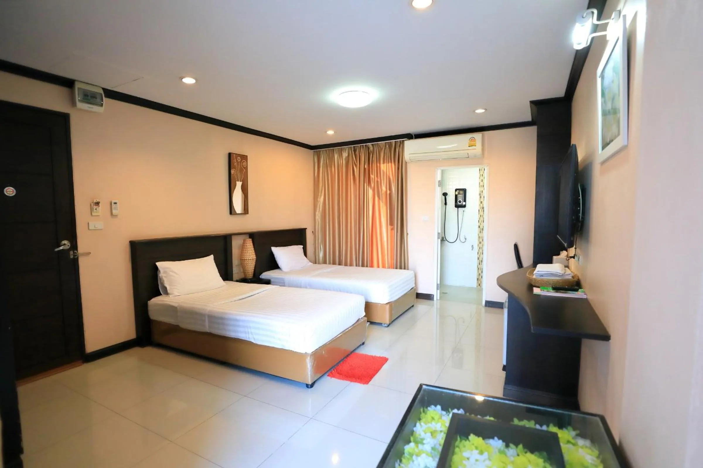 Bed in Triton Hotel Nakhonratchasima โรงแรมไททัน