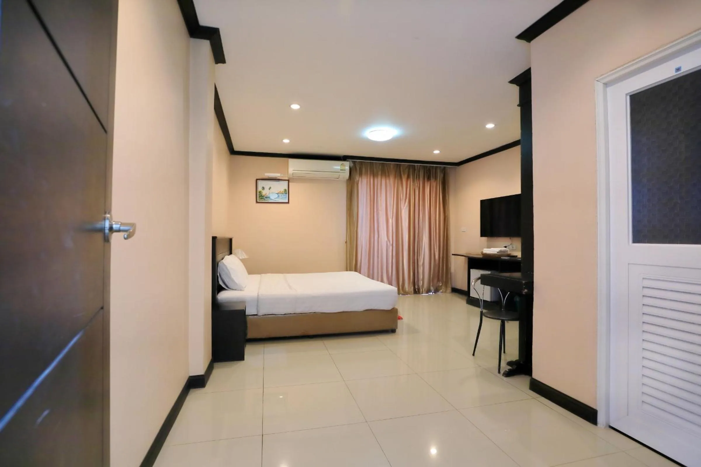 Bed in Triton Hotel Nakhonratchasima โรงแรมไททัน