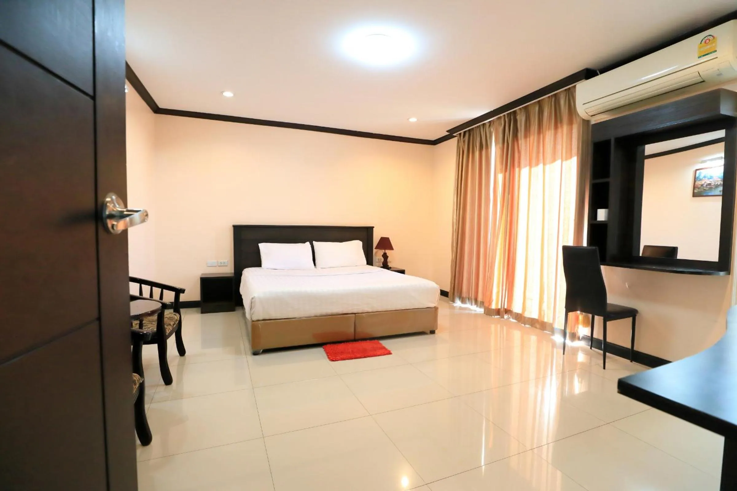 Bed in Triton Hotel Nakhonratchasima โรงแรมไททัน
