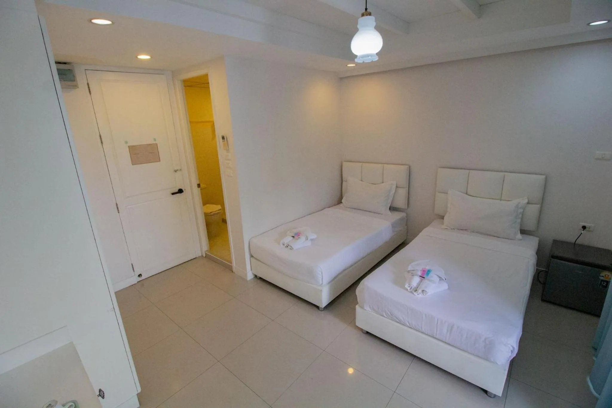 Bed in Skutan Inn Sutthisan Nexus Opal