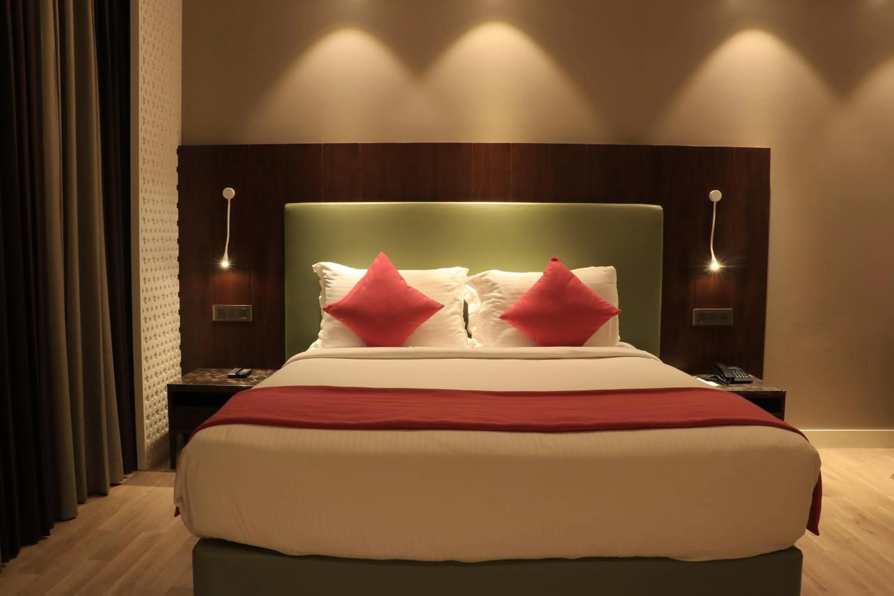 Bed in Tania President Inn