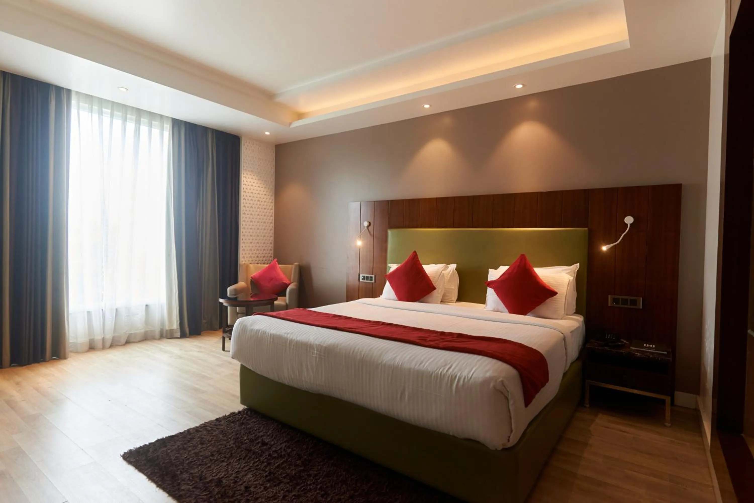 Bed in Tania President Inn