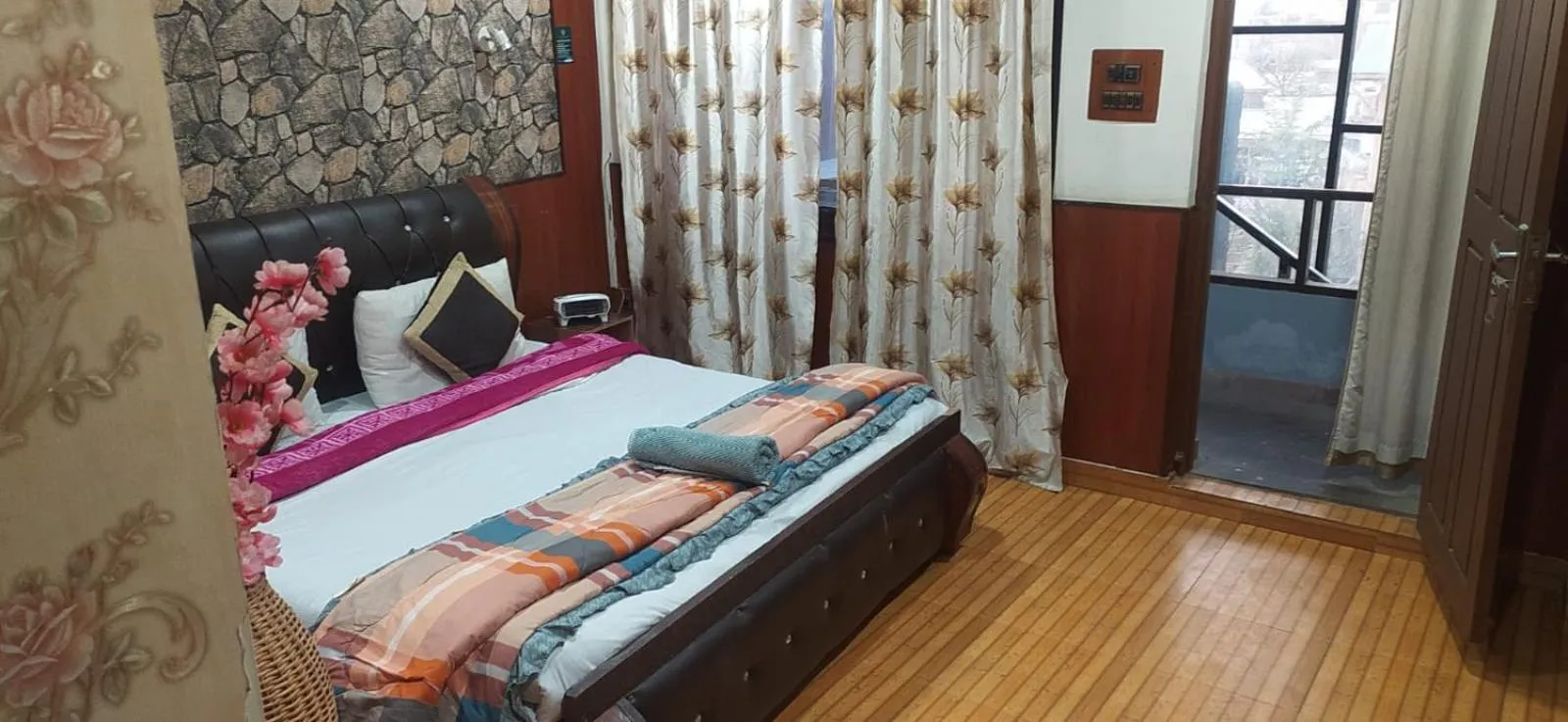 Bed in Heavenwood Heritage Hotel By Urban Inn Resorts