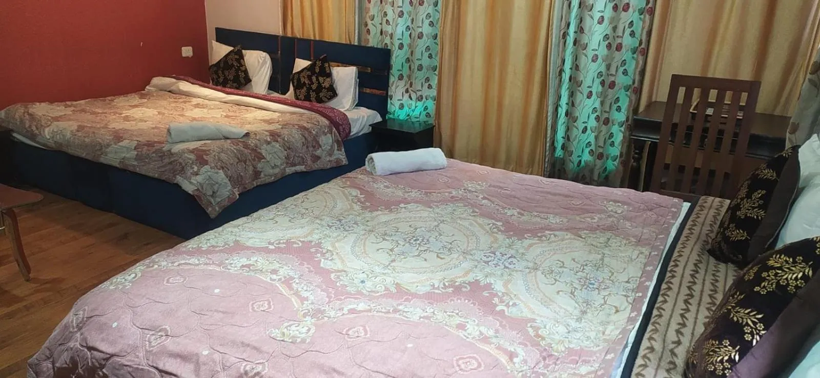 Bed in Heavenwood Heritage Hotel By Urban Inn Resorts