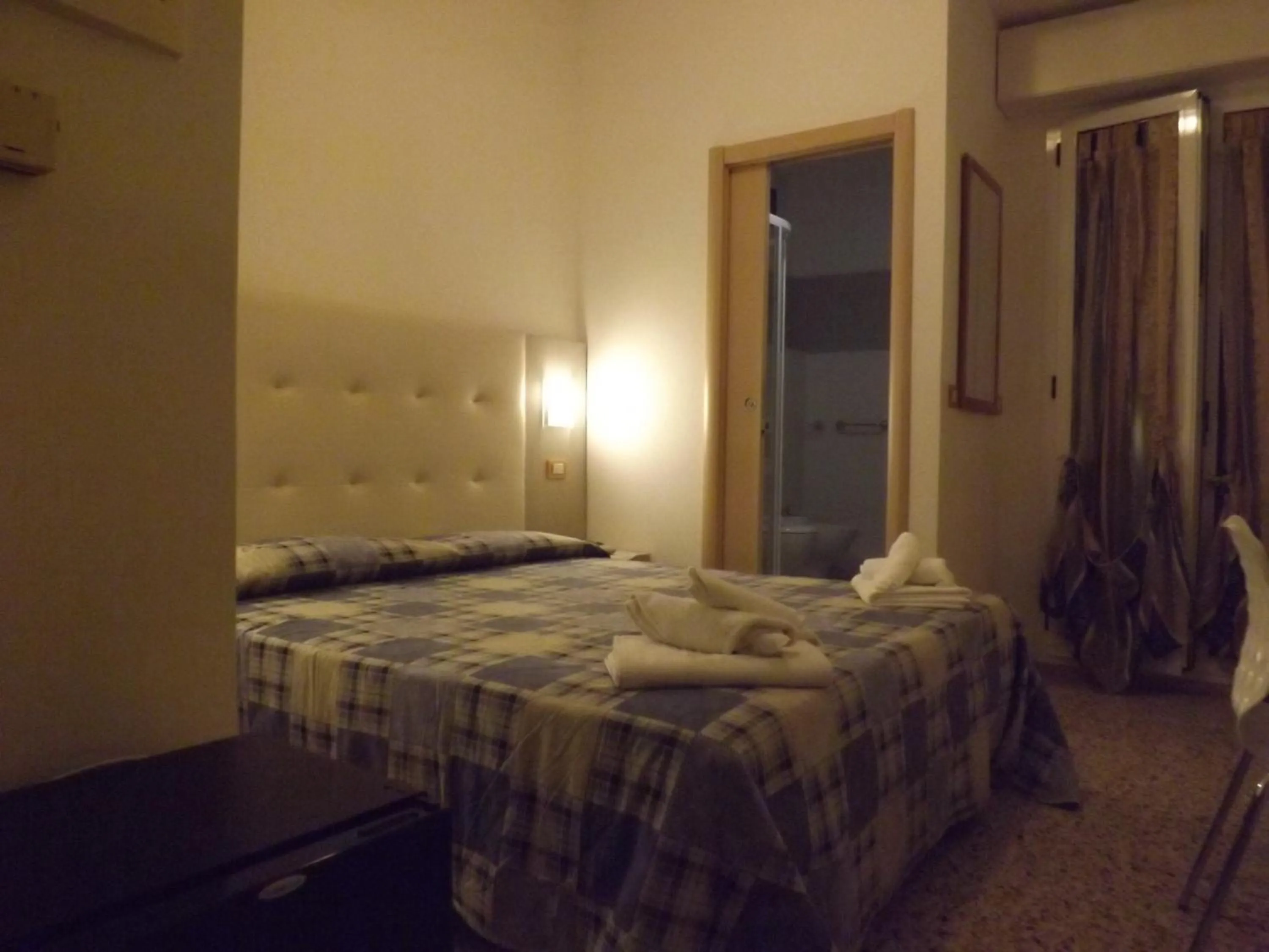Bed in Hotel Aurora