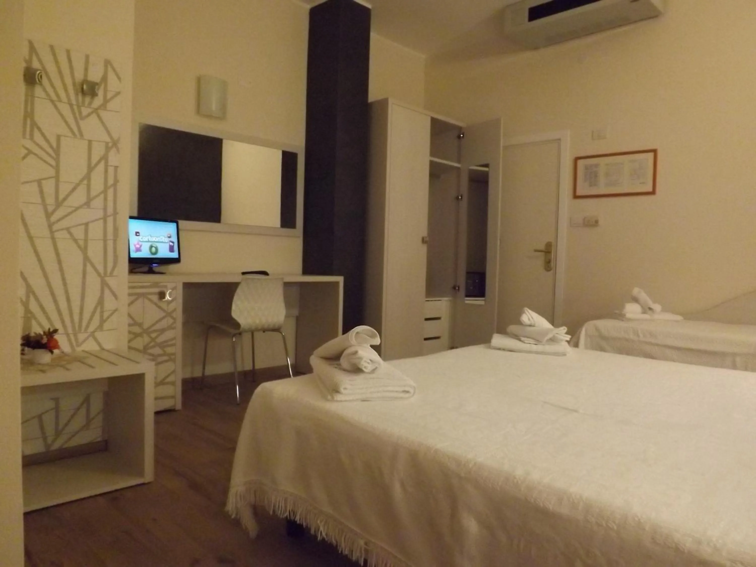 Bed in Hotel Aurora